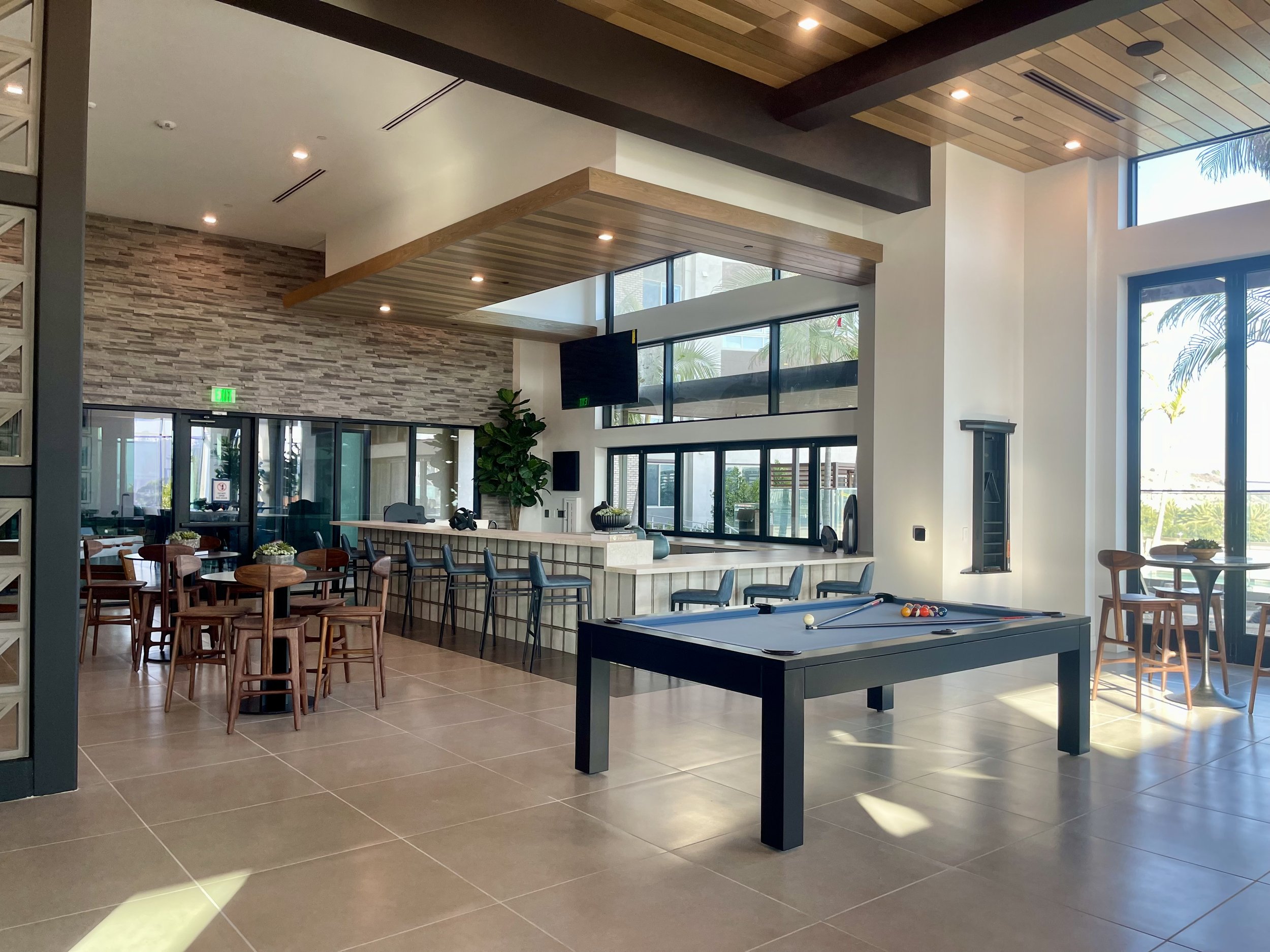 PAC STUDIO_The Brynn_Multifamily_Indoor Outdoor_Bar 01