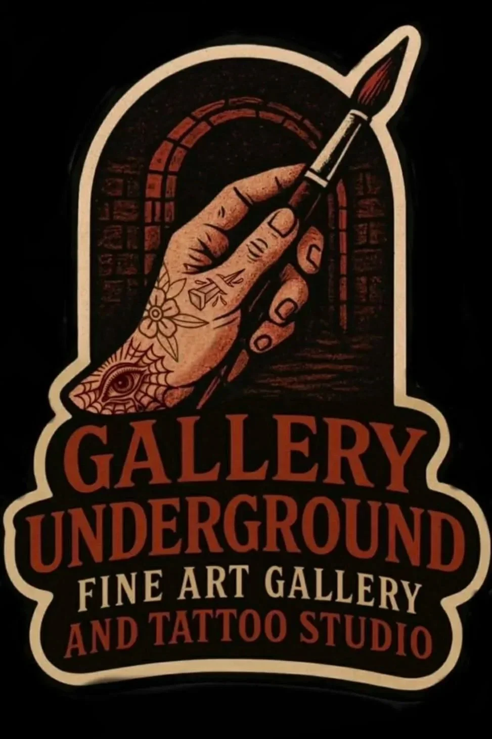 Tattooed hand holding a paintbrush, with the text 'Gallery Underground Fine Art Gallery and Tattoo Studio' below.