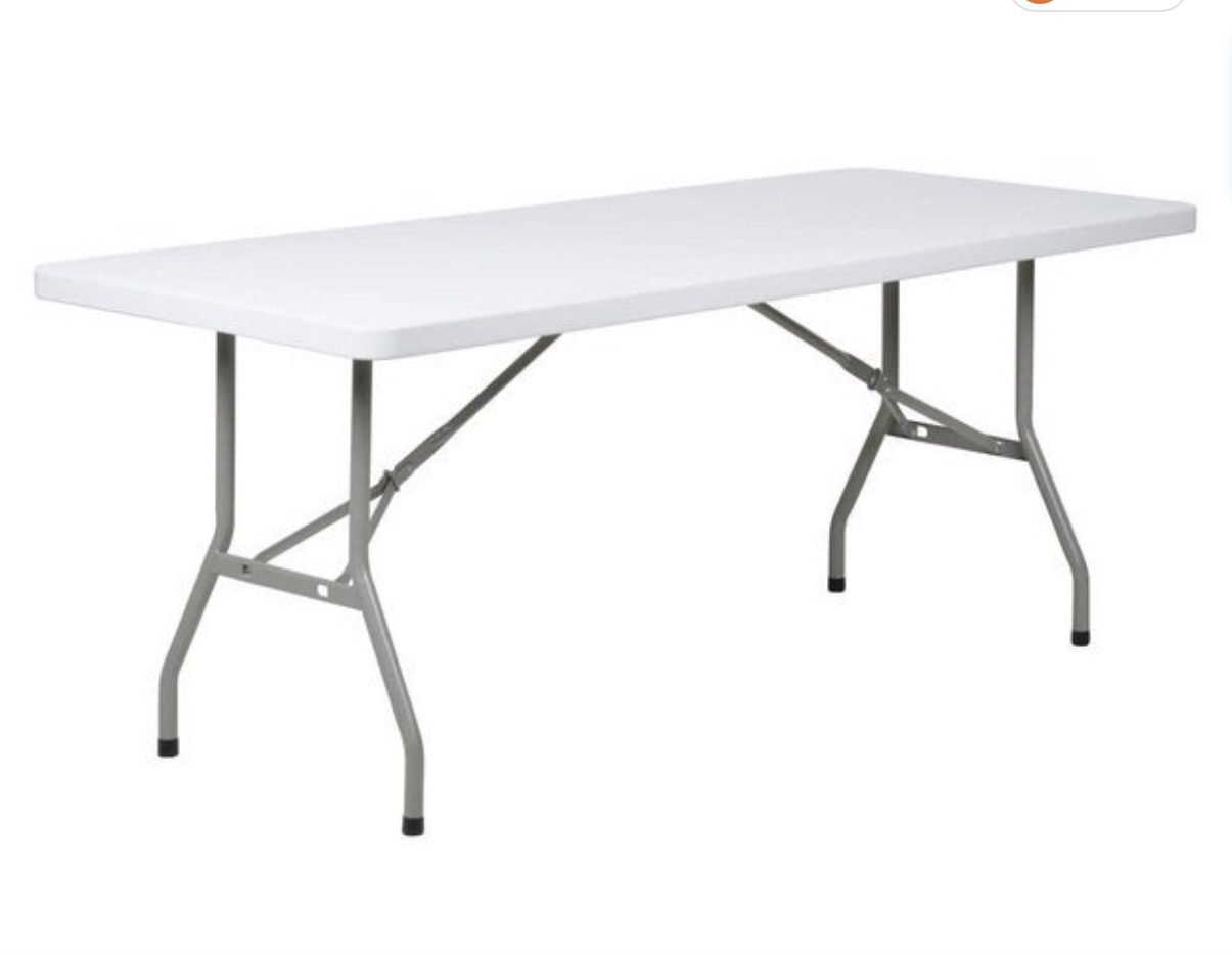 A folding white table with metal legs.