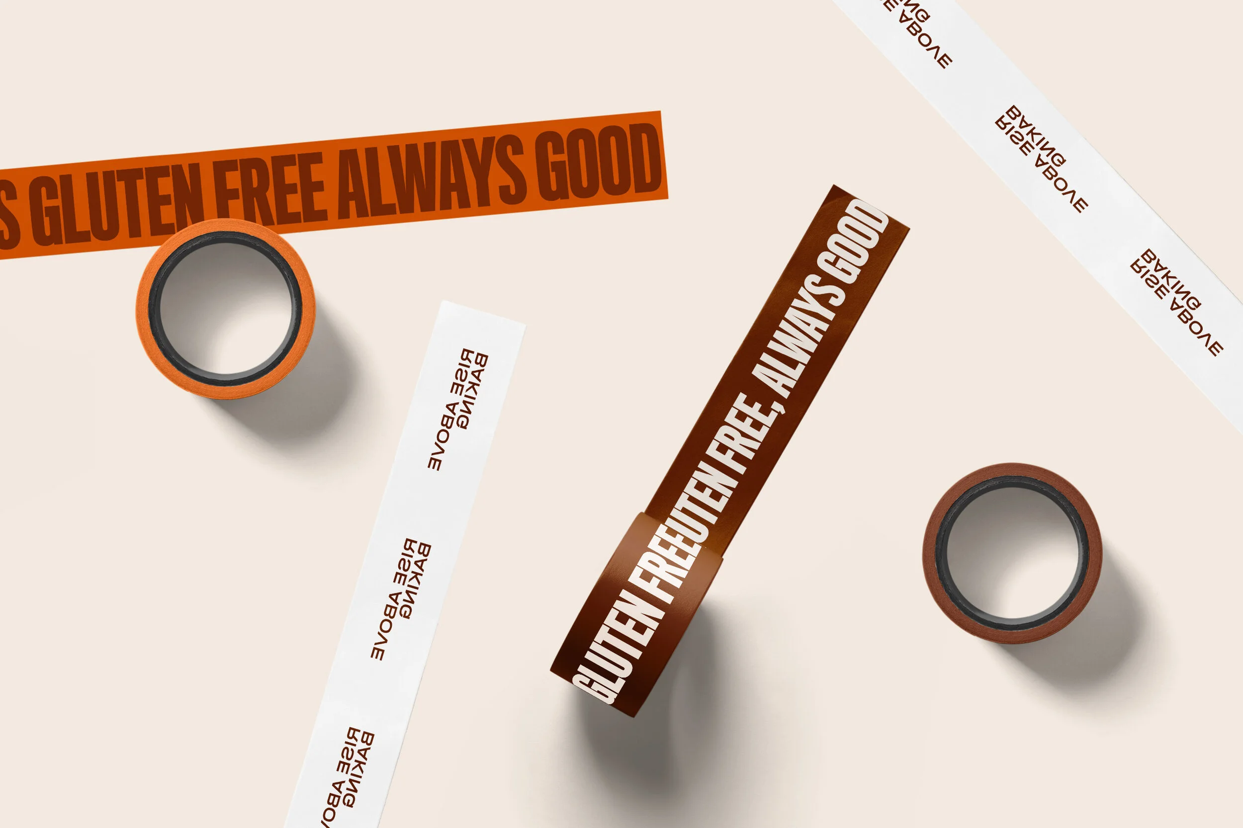 Assorted brown and white gluten-free product packaging with text that says "Gluten Free Always Good," on a beige background.