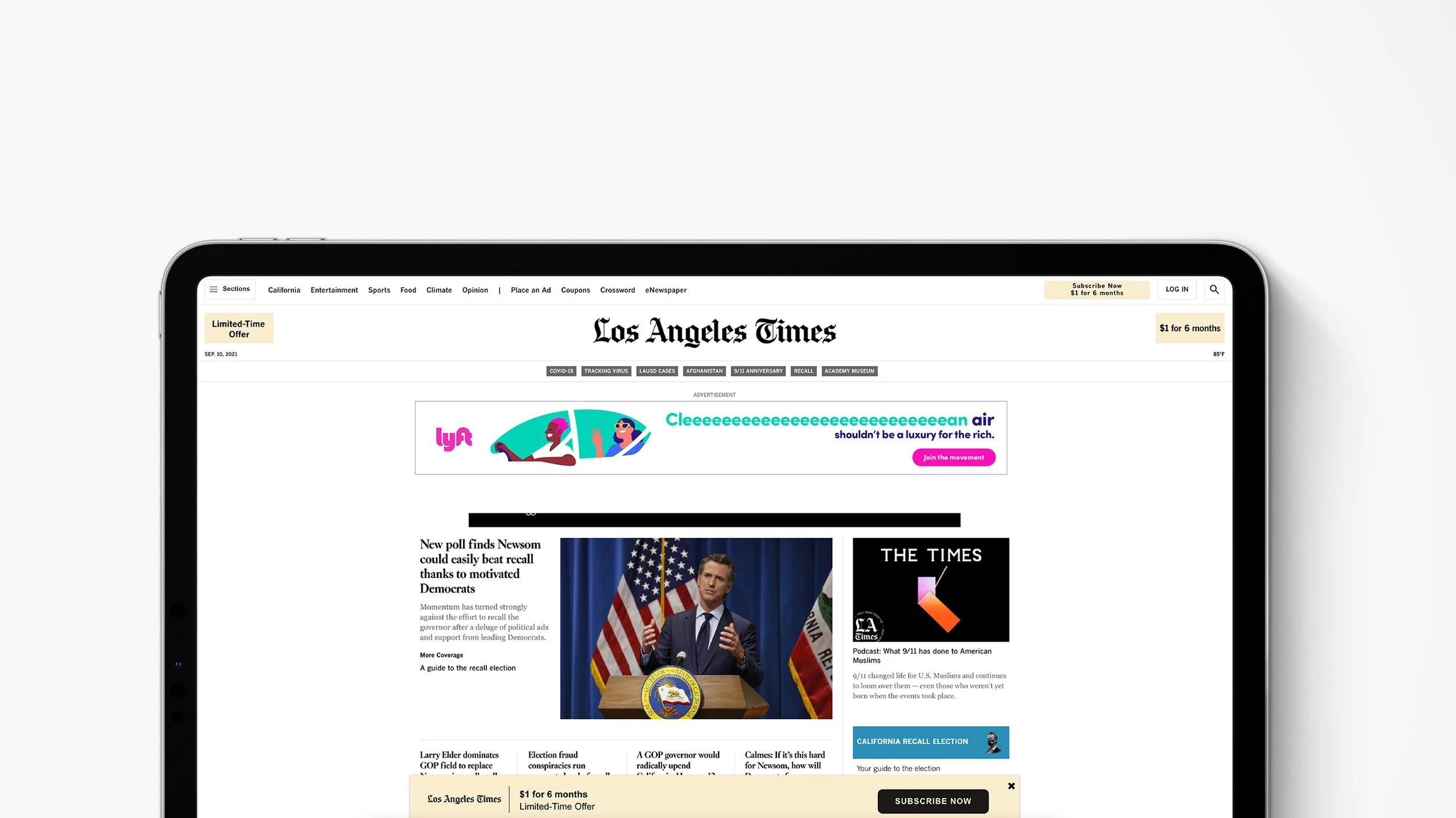 Screenshot of the Los Angeles Times homepage on a tablet, showing news articles, a weather update, and advertisements.