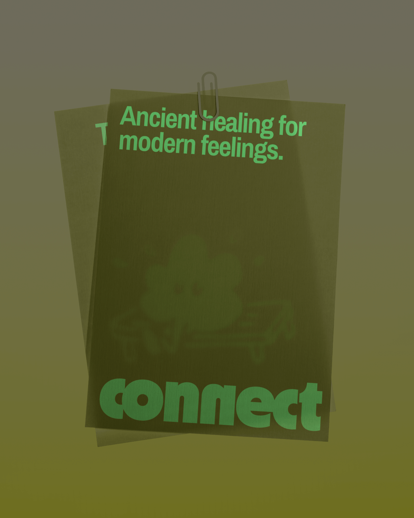 A green pamphlet titled 'Ancient Healing for modern feelings' with partial text visible, attached to a paperclip.