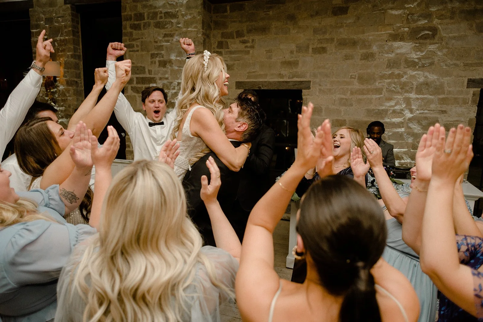 Wedding guests celebrating on the dance floor at a QA Entertainment wedding reception in the Greater Toronto Area