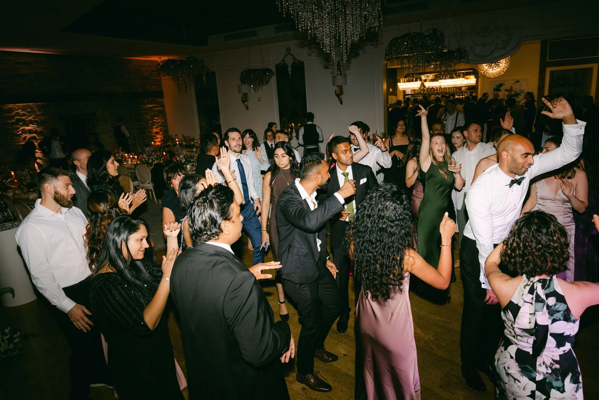 Wedding guests filling the dance floor at a QA Entertainment reception in the Greater Toronto Area