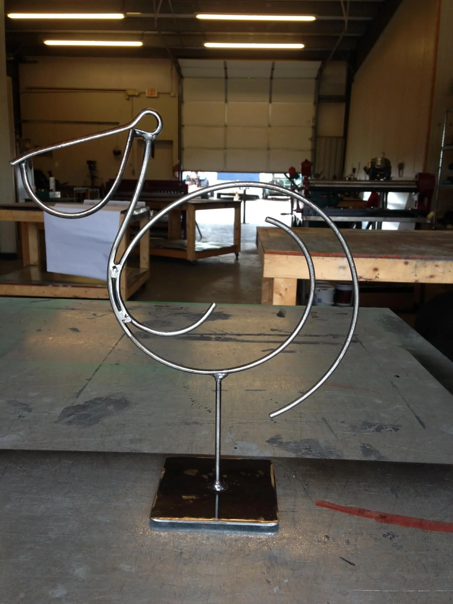 Our hand forged steel cat bowl holder is crafted in Coinjock, NC using traditional blacksmith techniques. Each piece is individually shaped from solid steel, creating a durable, stable feeding station designed to last for years.

Unlike mass-produced