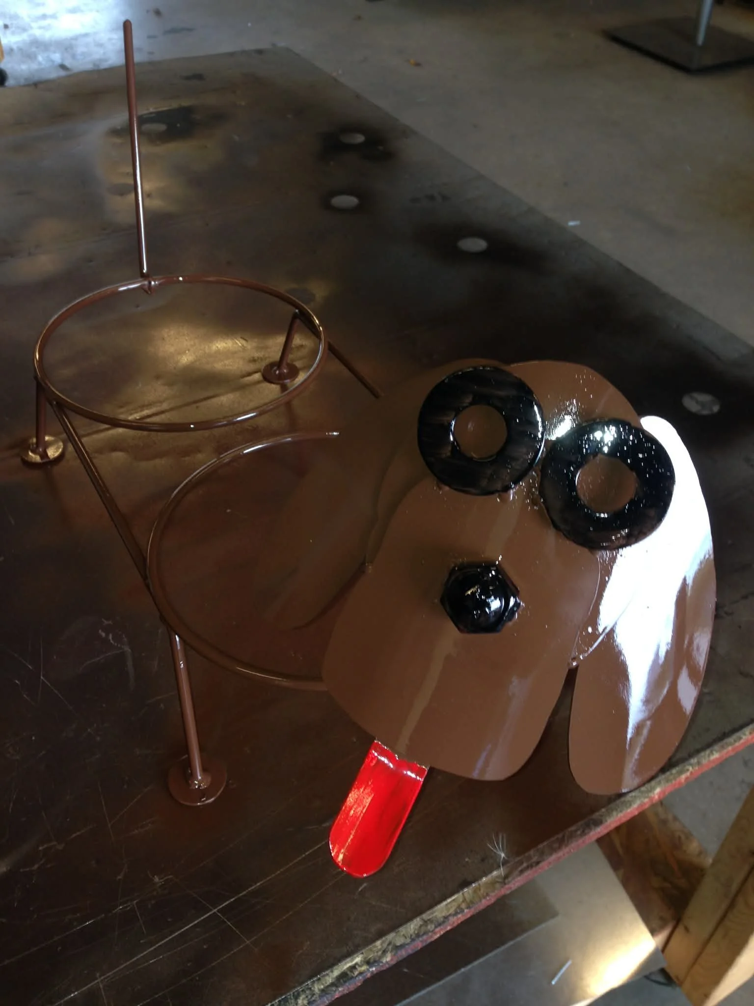 Our hand forged steel dog bowl holder is crafted in Coinjock, NC using traditional blacksmith techniques. Each piece is individually shaped from solid steel, creating a durable, stable feeding station designed to last for years.

Unlike mass-produced