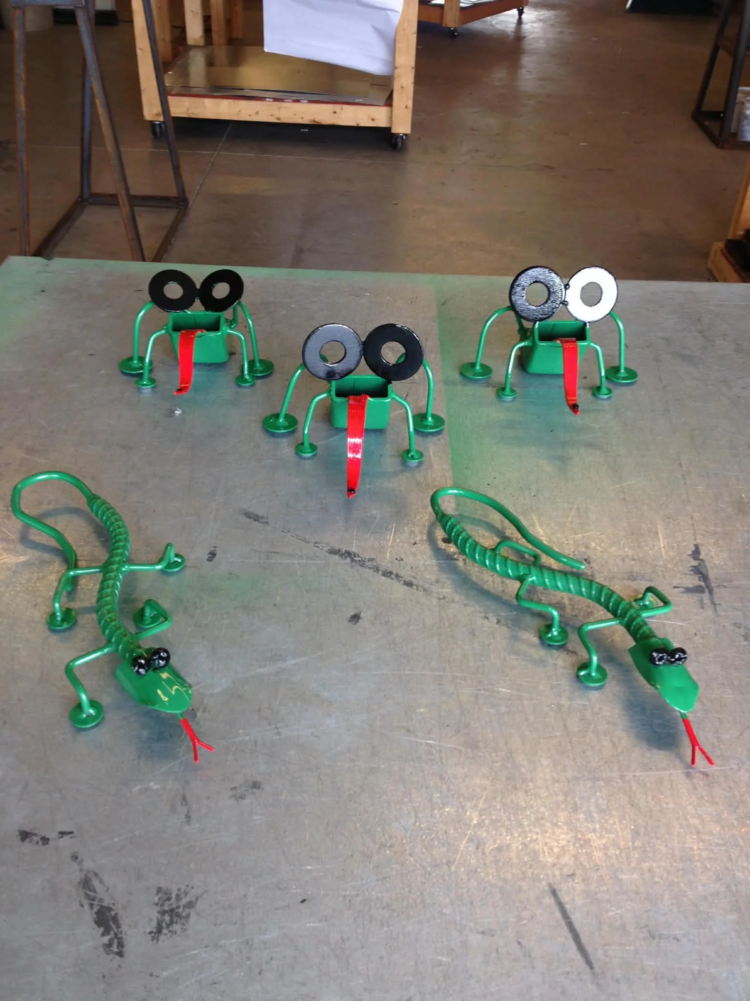 Our hand forged metal lizards and frogs are individually crafted from solid steel using traditional blacksmith techniques in Coinjock, NC. Each piece is shaped by hand, giving every sculpture its own unique character and texture.

These steel reptile