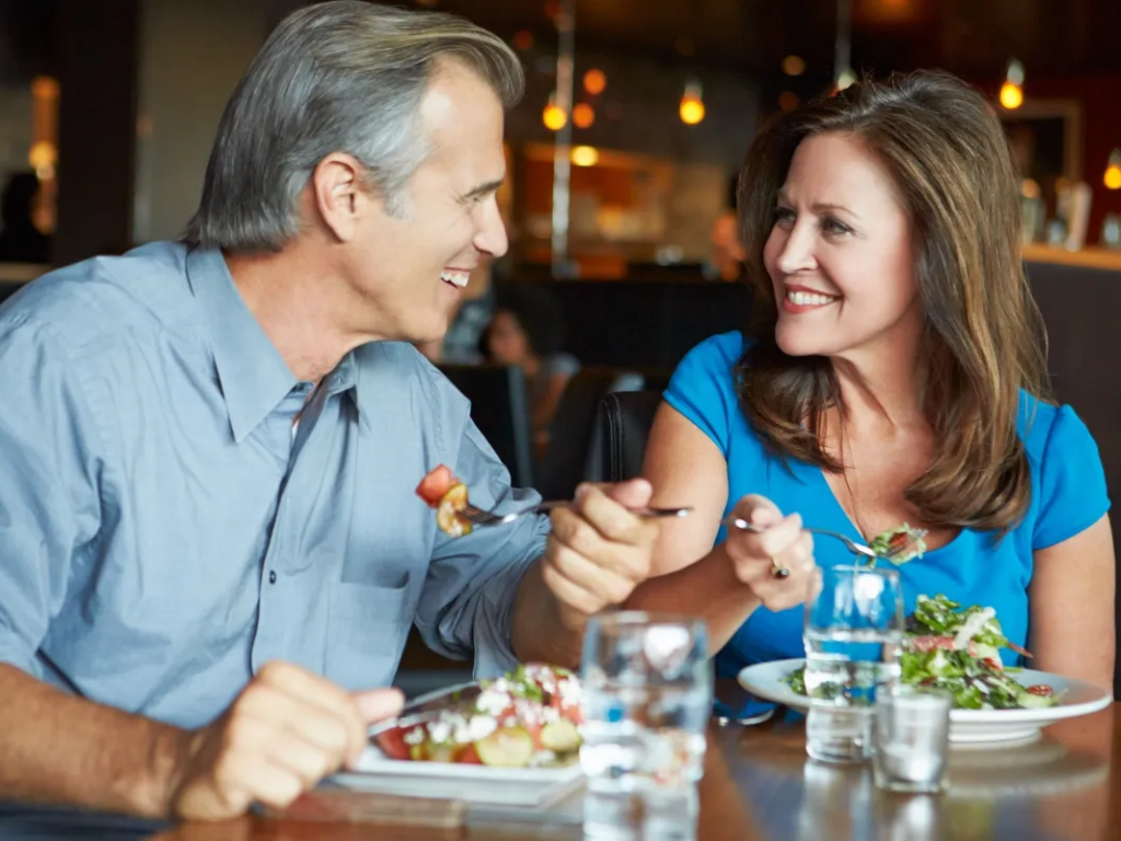 couple enjoying a healthy meal representing how diet can support circulation and vascular health