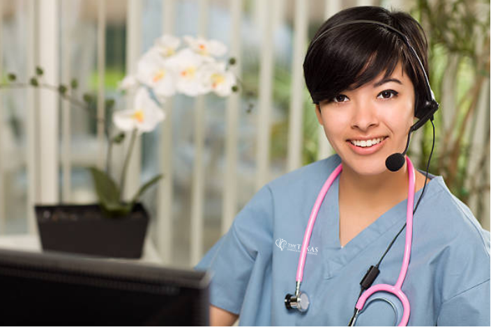 healthcare staff member wearing headset assisting patients with vascular appointment scheduling