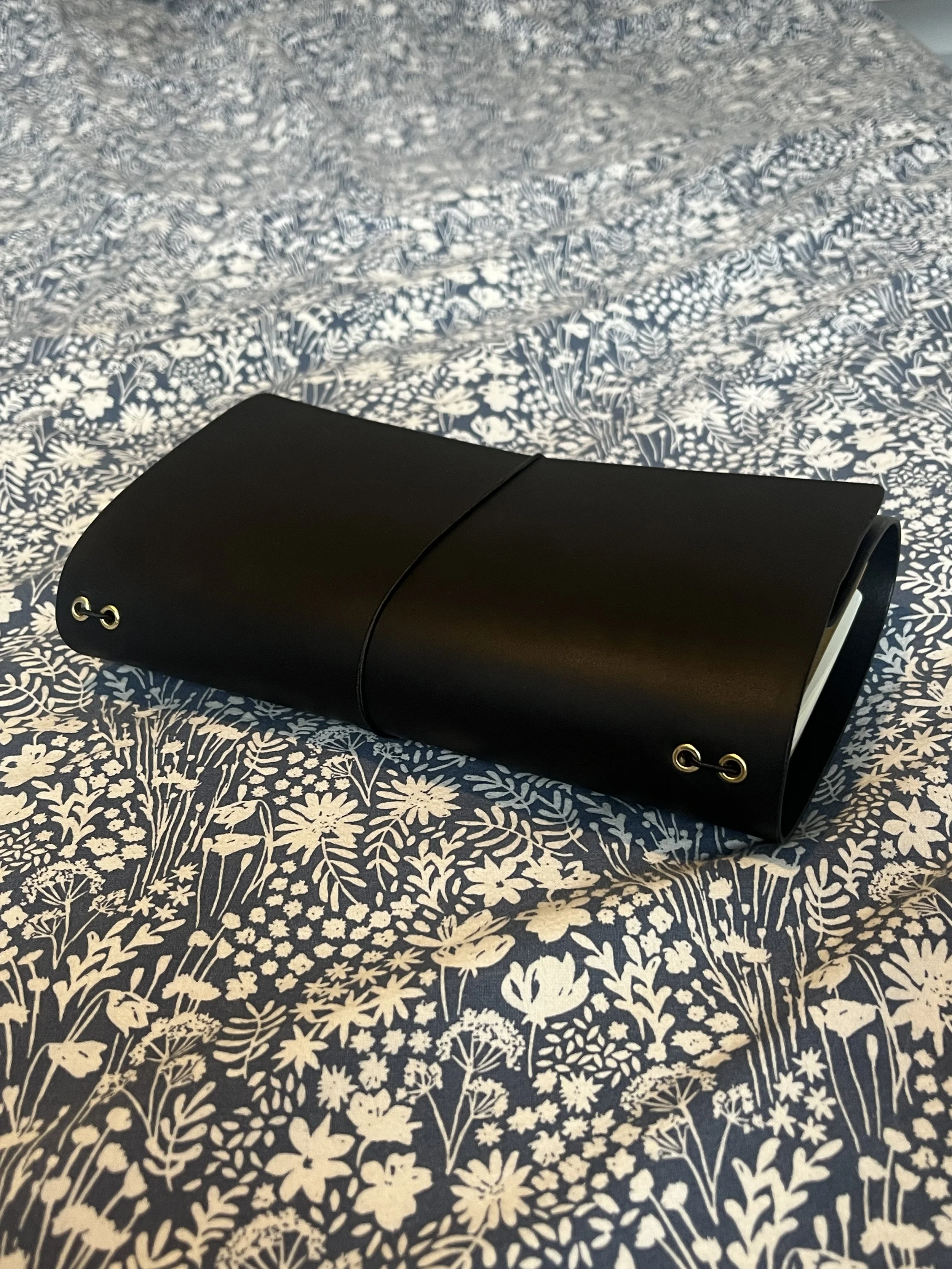 black journal veg tan laether.jpg