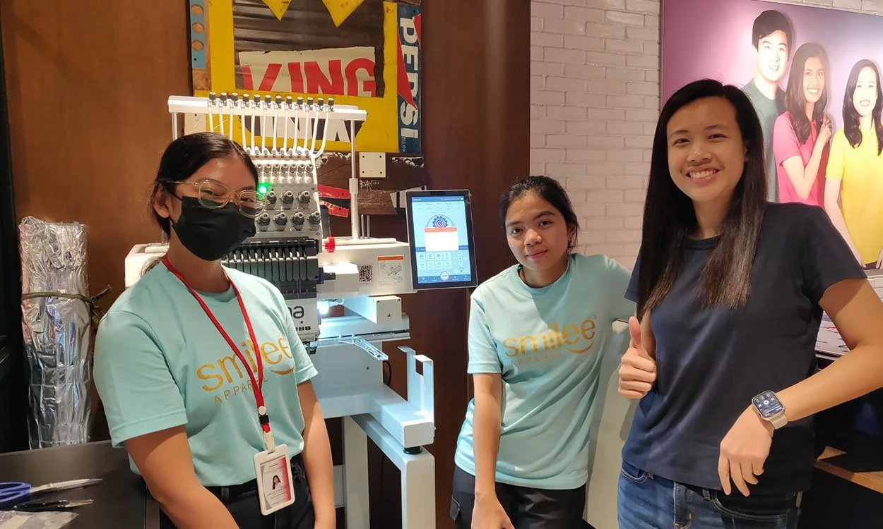 Bleuciel Automations Inc. working closely with a client during an industrial embroidery machine installation in the Philippines