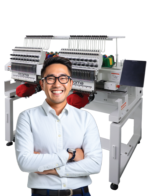 a smiling business man in white polo shirt with Ricoma 4 heads embroidery machine in the background