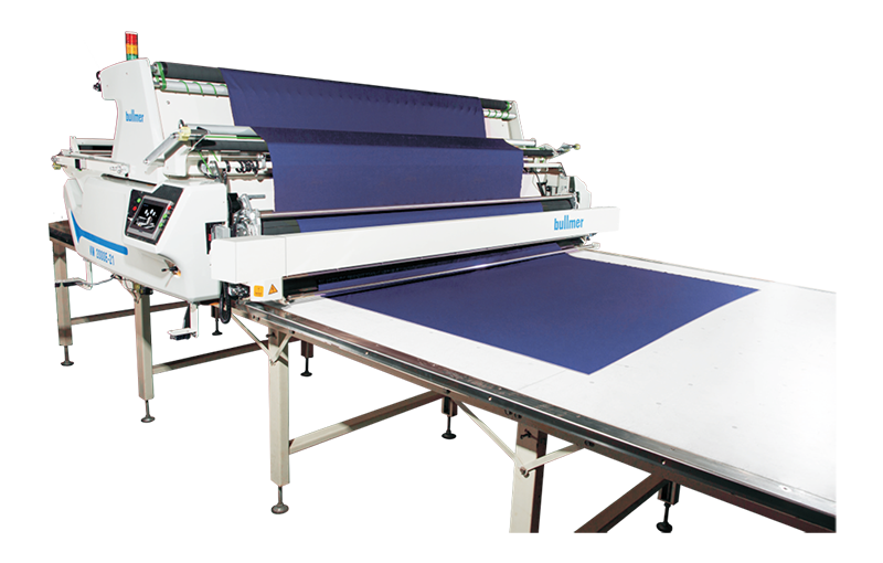 Industrial fabric printer with blue fabric being printed on