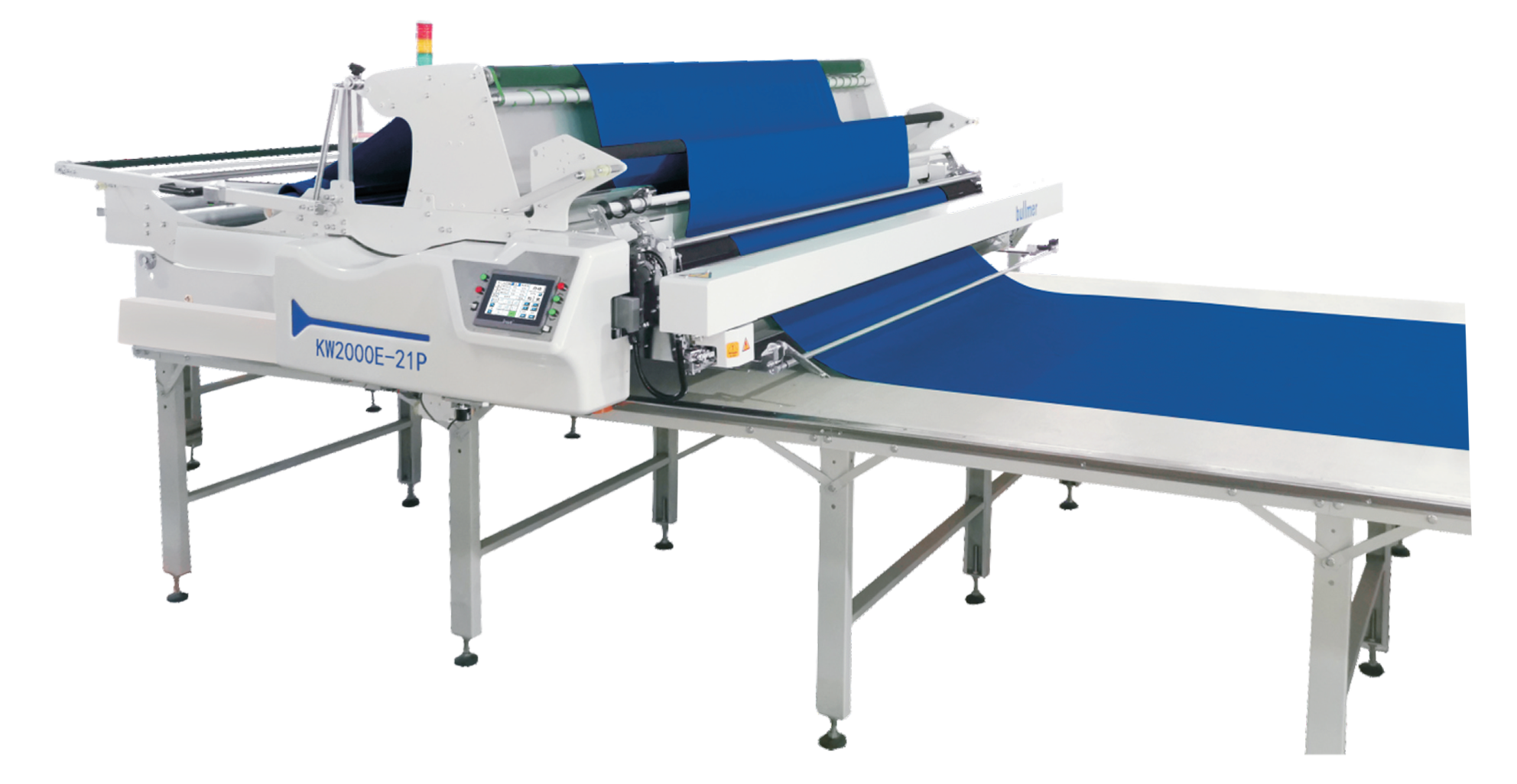 Industrial fabric cutting machine with a blue fabric being fed through it on a metal table.