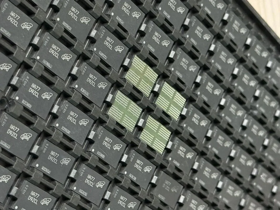 IC sourcing and supply for industrial applications, showing packaged integrated circuits on trays