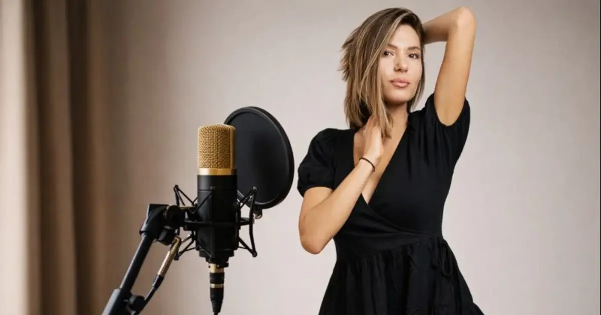 Luna M recording music in studio with professional microphone