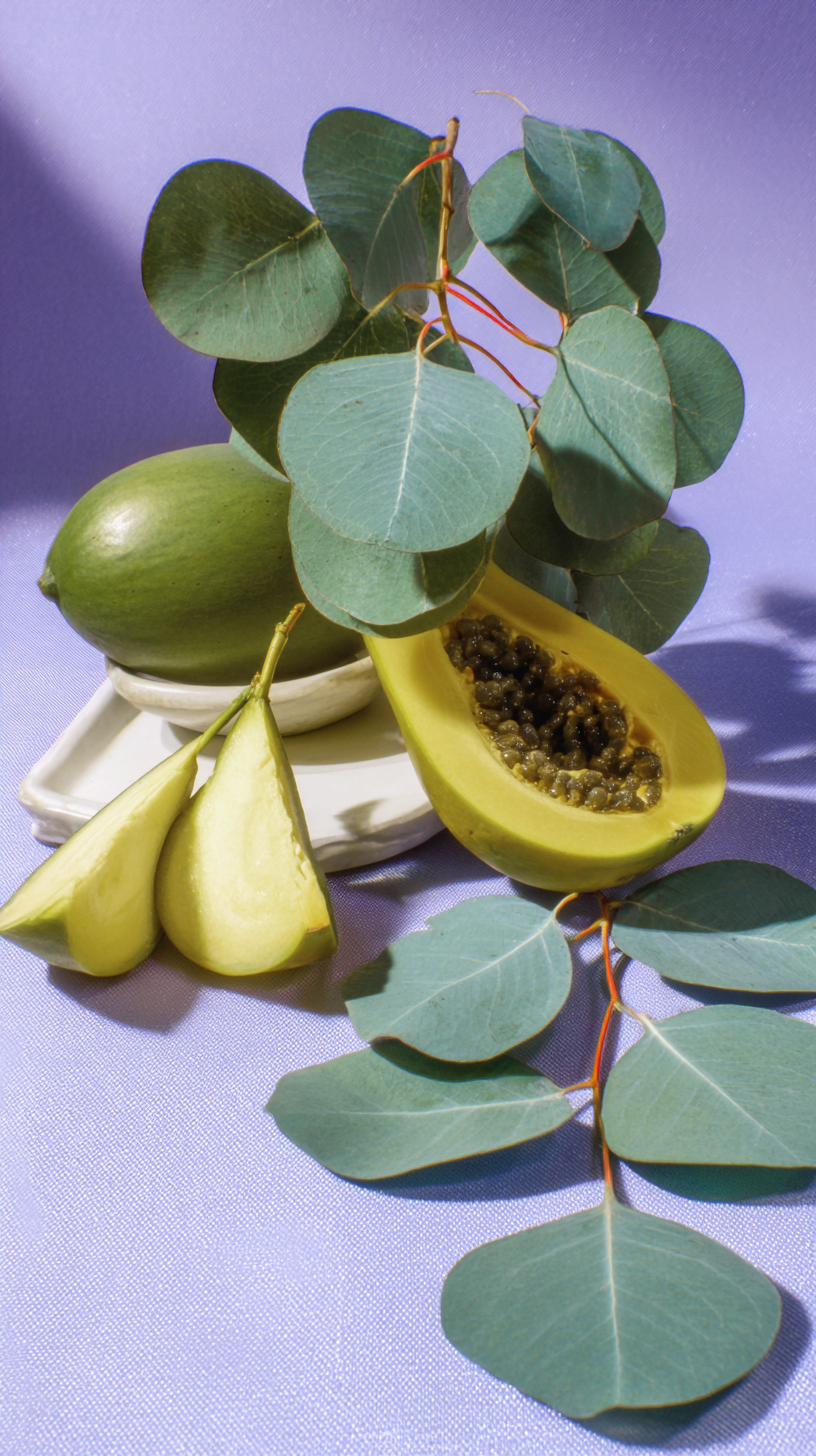 Fresh green passion fruit and leaves arranged on a white dish against a purple background.