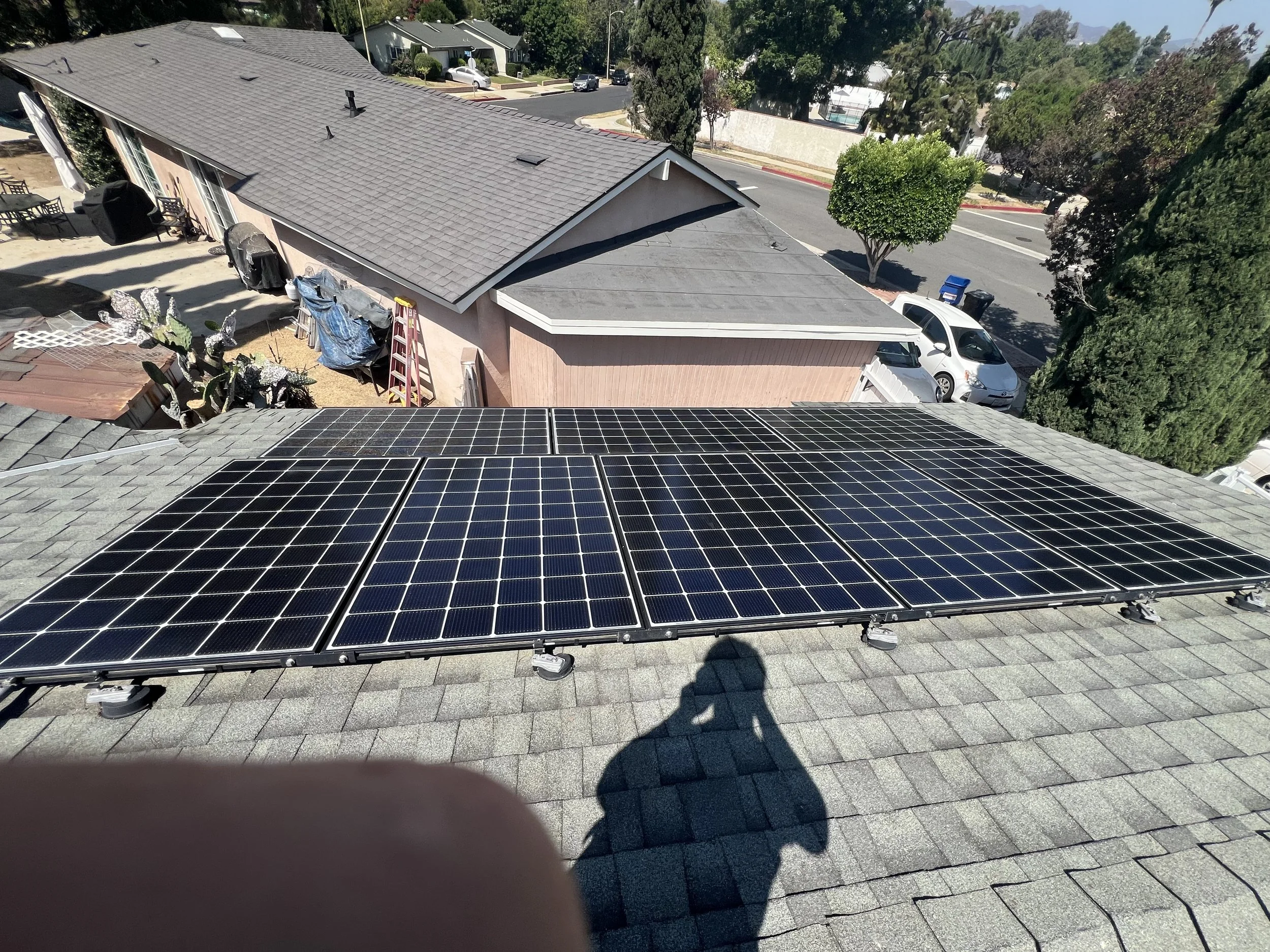 A rooftop with solar panels installed.