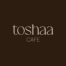 Toshaa Cafe logo with white text on a dark brown background.
