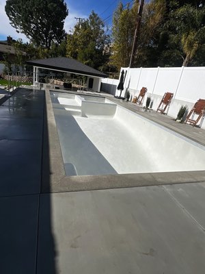 Close-up of premium pebble pool finish