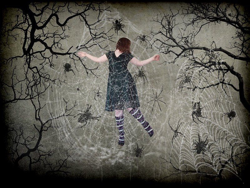 girl tapped in a web of surveillance