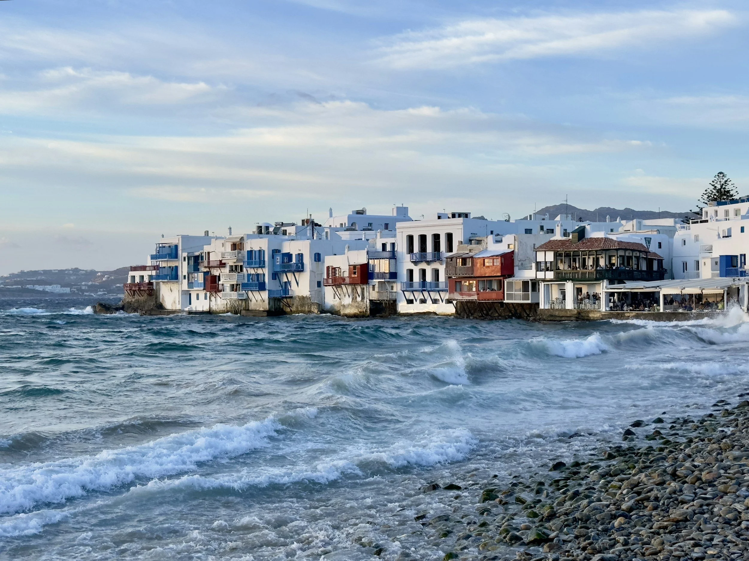 Waves at a beach in front of Little Venice in Mykonos.