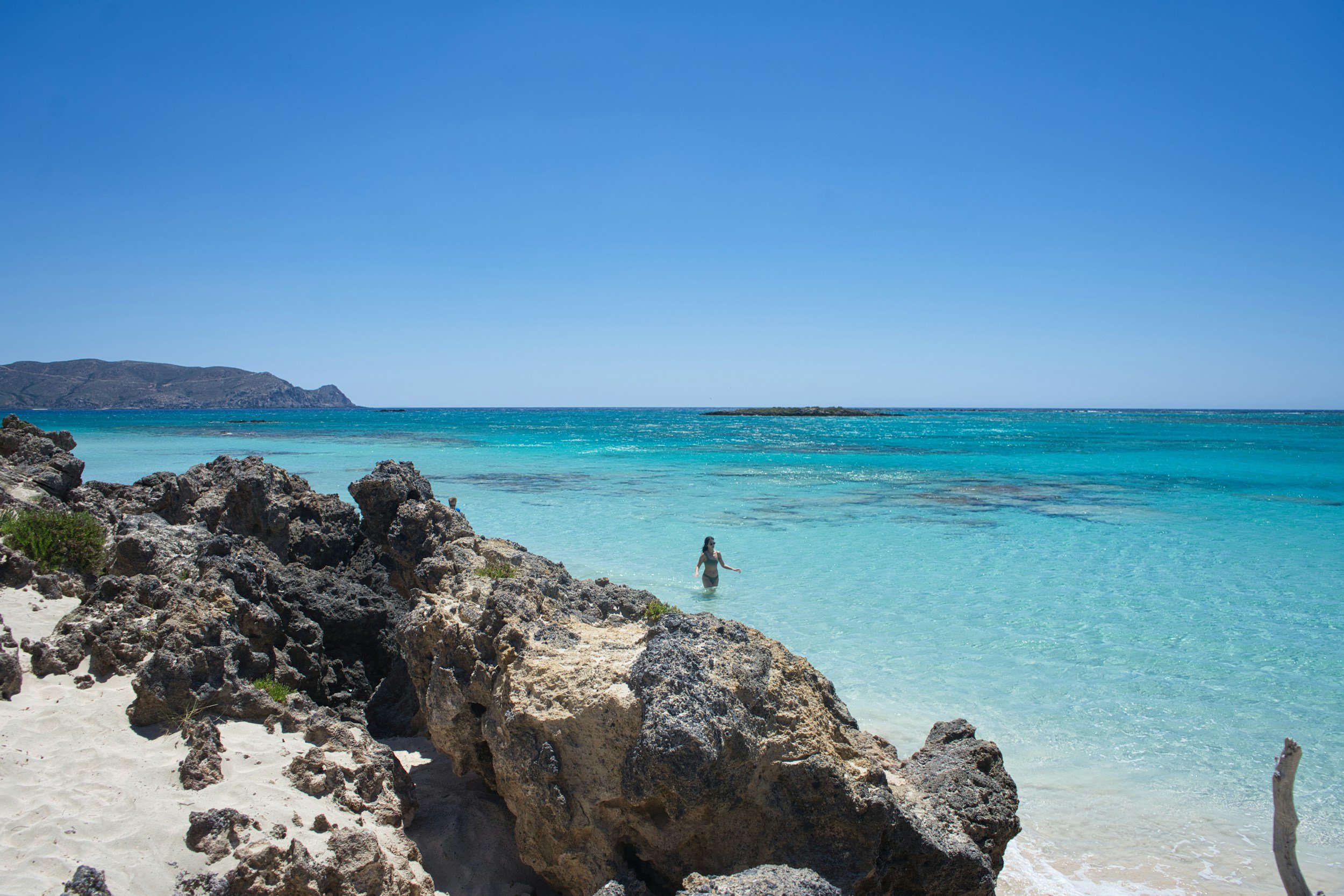 Rocks and turquoise water at Elafonissi Beach in Crete.