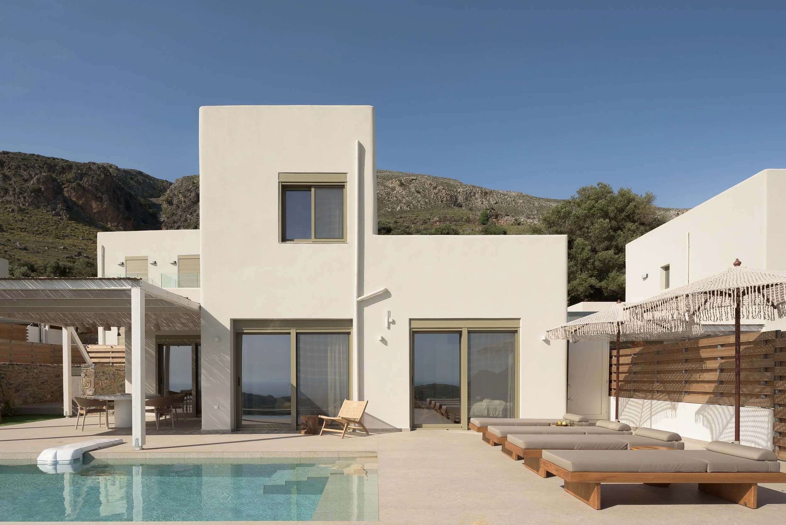 Sto Lofo villa terrace near Asomatos and Plakias, South Crete, with private pool and panoramic views in a bright, open setting.