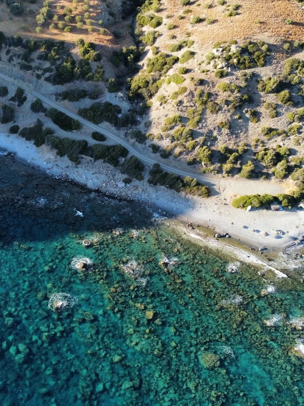 Aerial view of the South Crete coastline near Agios Pavlos with turquoise Libyan Sea, beach and cliffs.