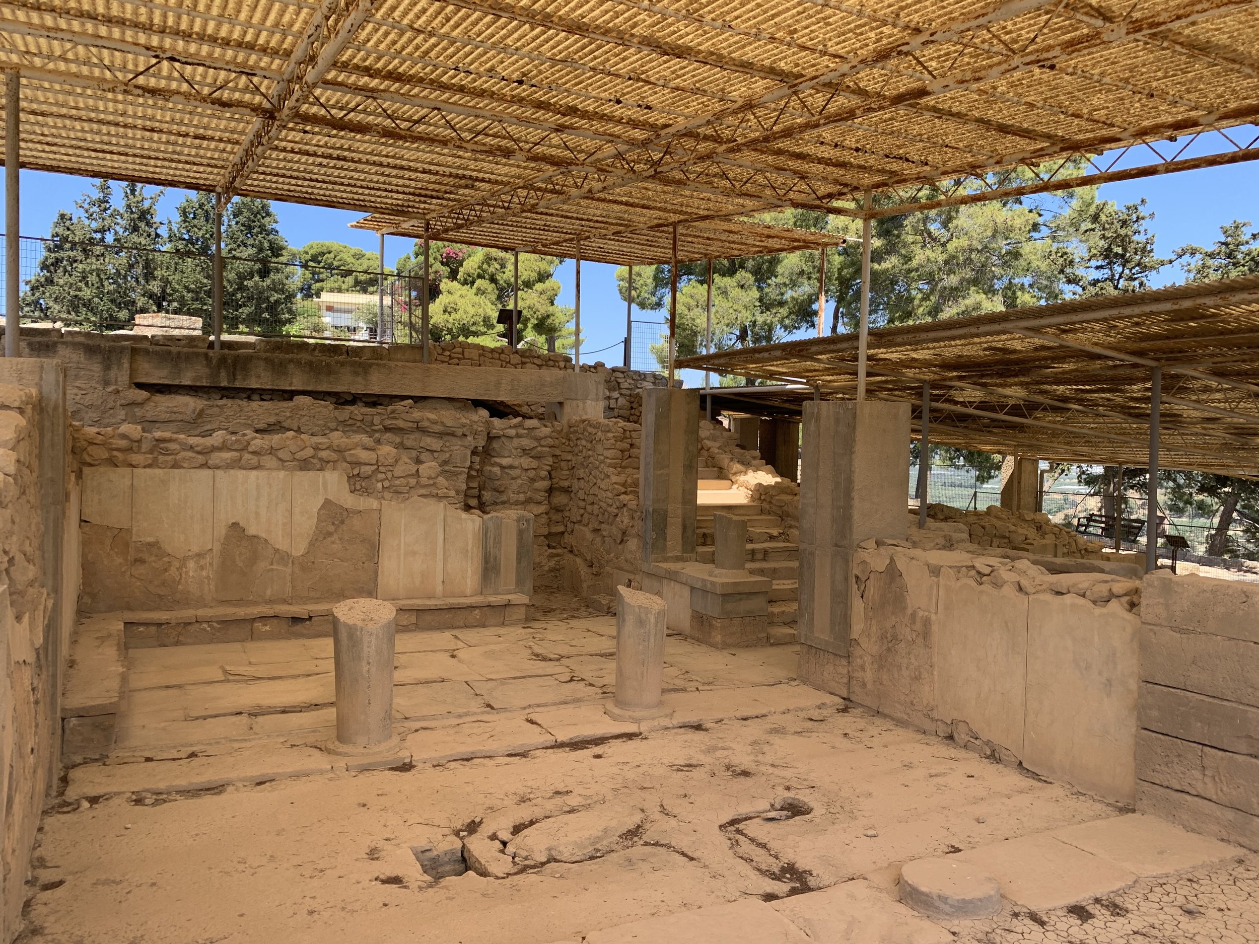 Royal quarters and ceremonial spaces within the Palace of Phaistos, showcasing the architecture of Minoan Crete overlooking the Messara Plain.