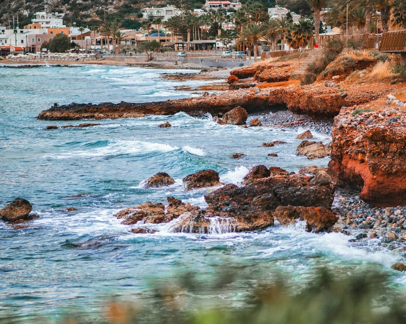 Waves crashing against rocks at the coast in Crete.