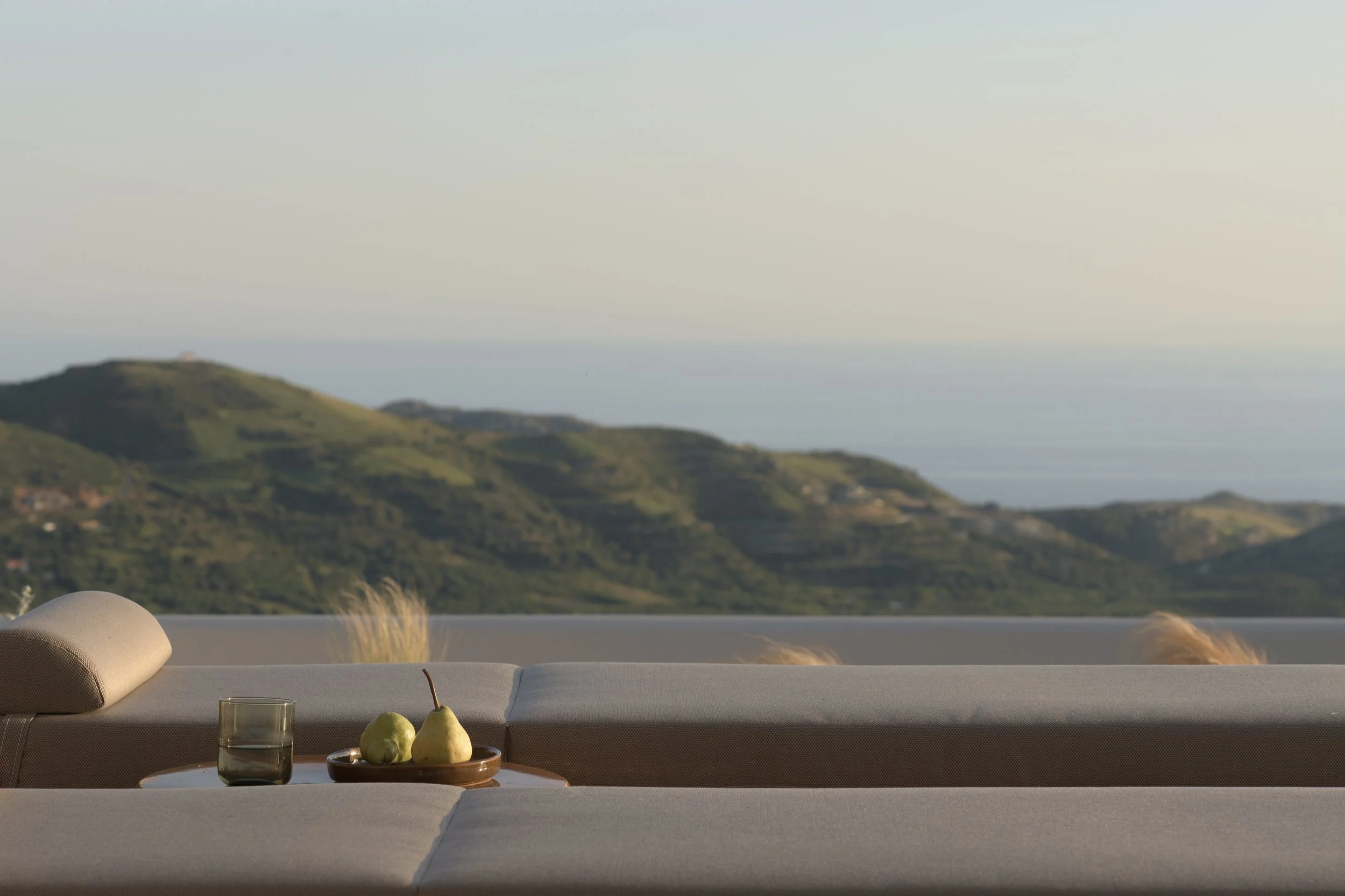 View across sun loungers towards the bay of Plakias from Villa Sto Lofo, Asomatos
