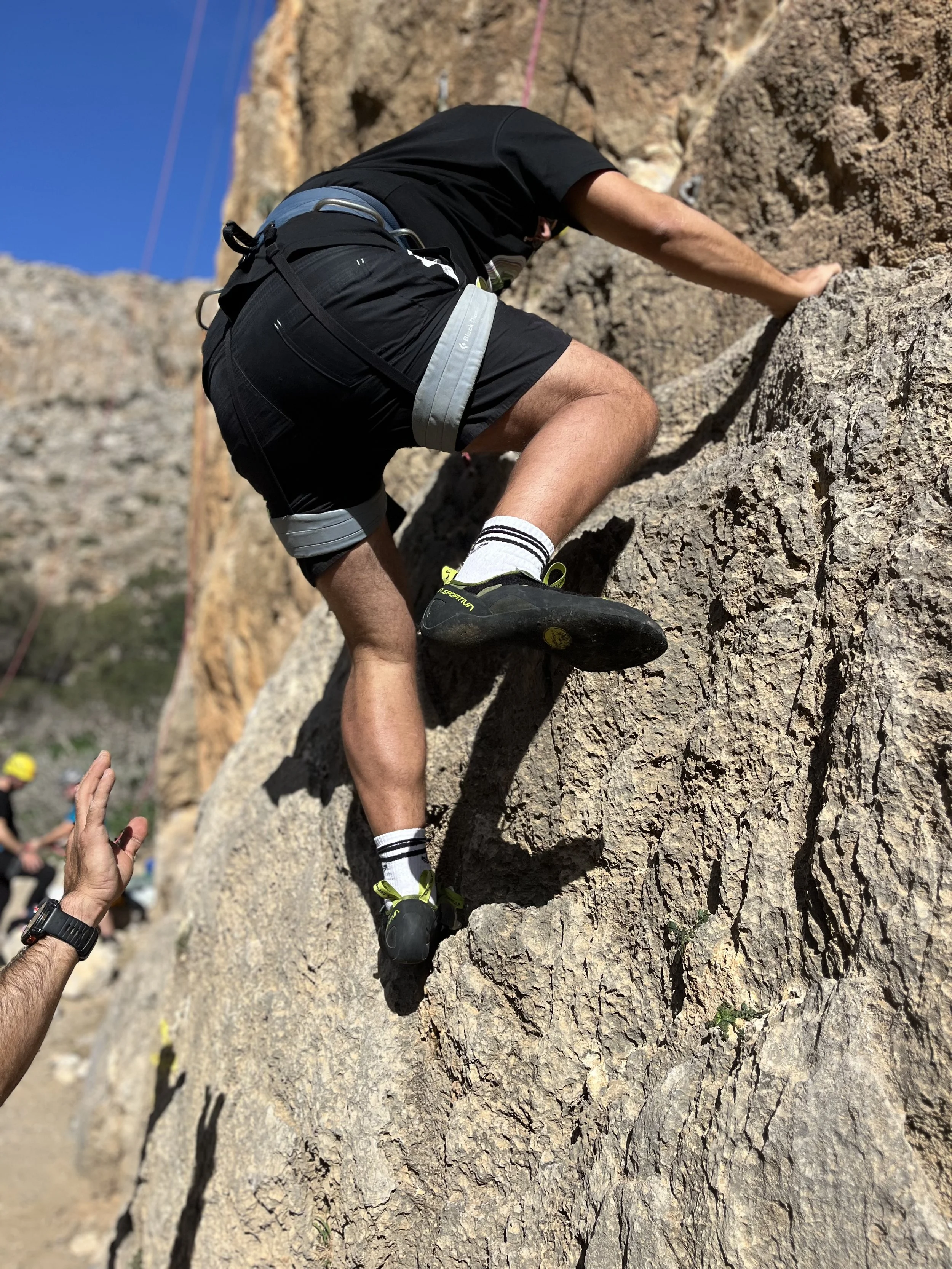 Close-up of a man rock climbing at Agiofaraggo Gorge in South Crete.