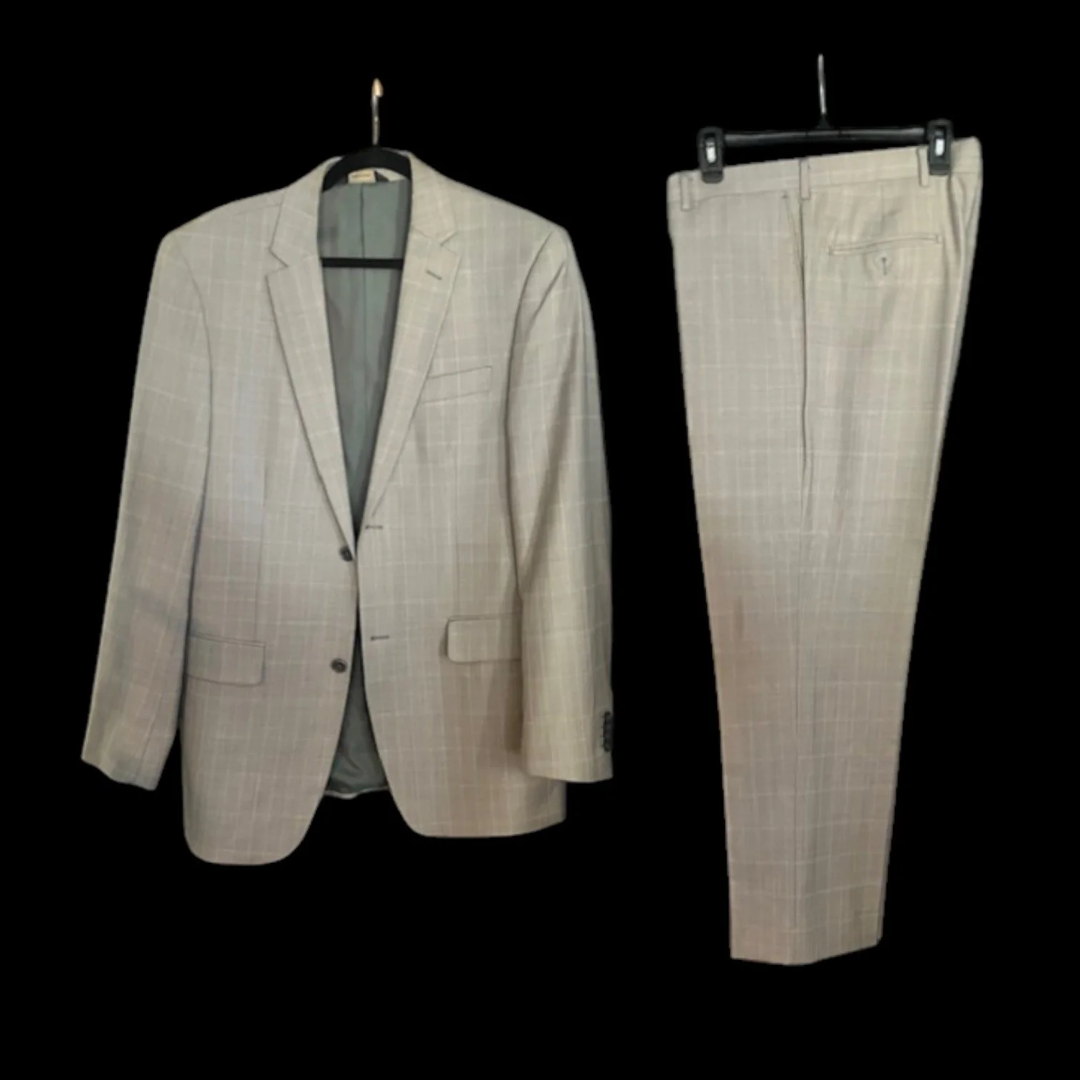 A Cashmere & Wool Suit it features a windowpane plaid pattern by Giorgio Cosani