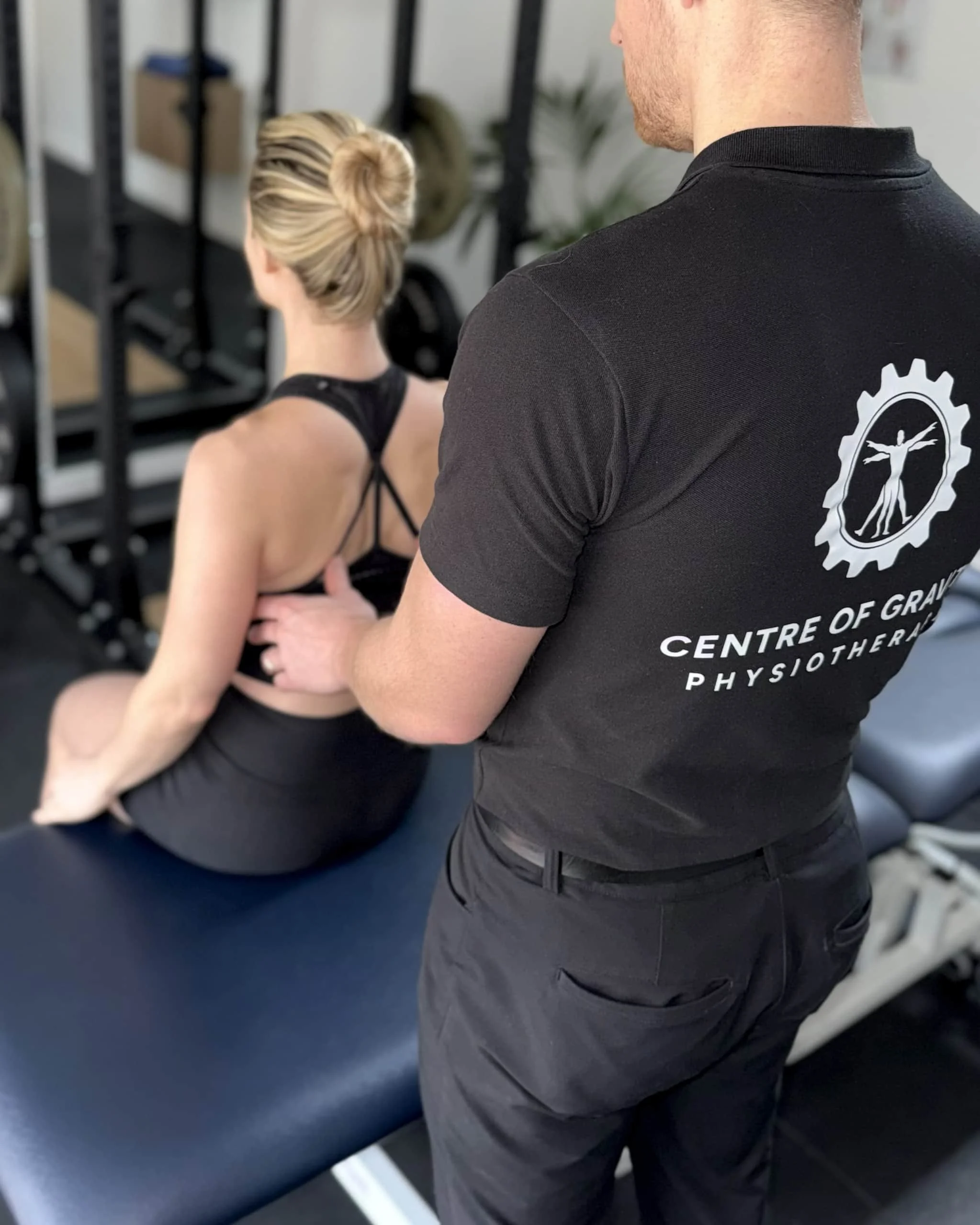 Harry Liniker (Physiotherapist) Assessing the posture of a patient