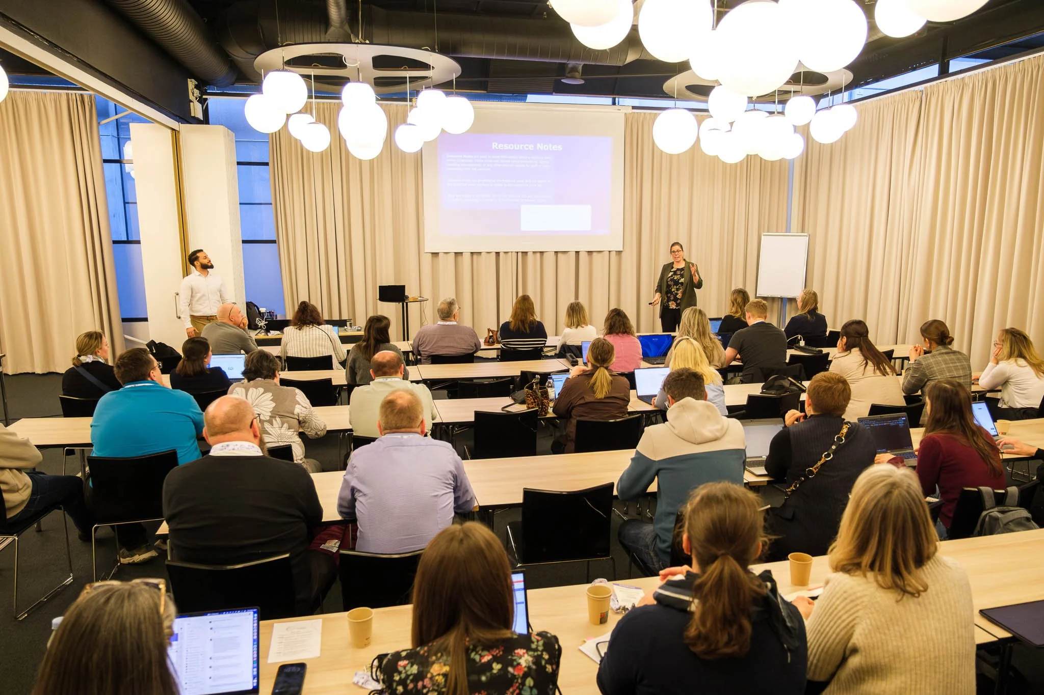 Workshop room with delegates and presenters at Illuminate EMEA 2026 — Copenhagen event photographer Ballo Studio