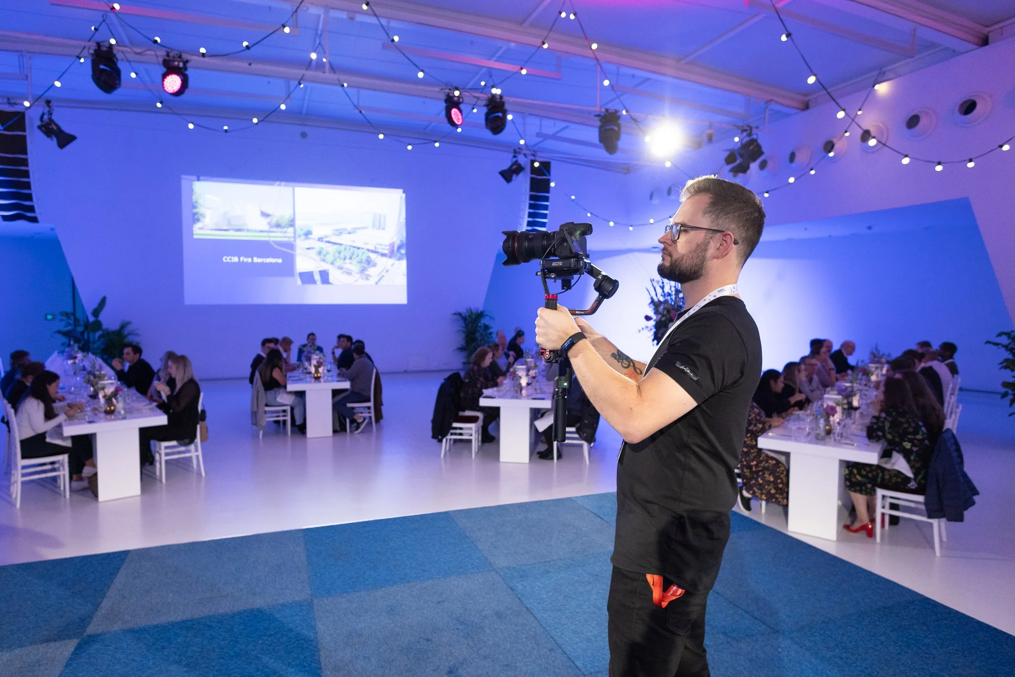 Behind-the-scenes video production at an Amsterdam trade show, providing local event videography and on-site interview filming for corporate clients.