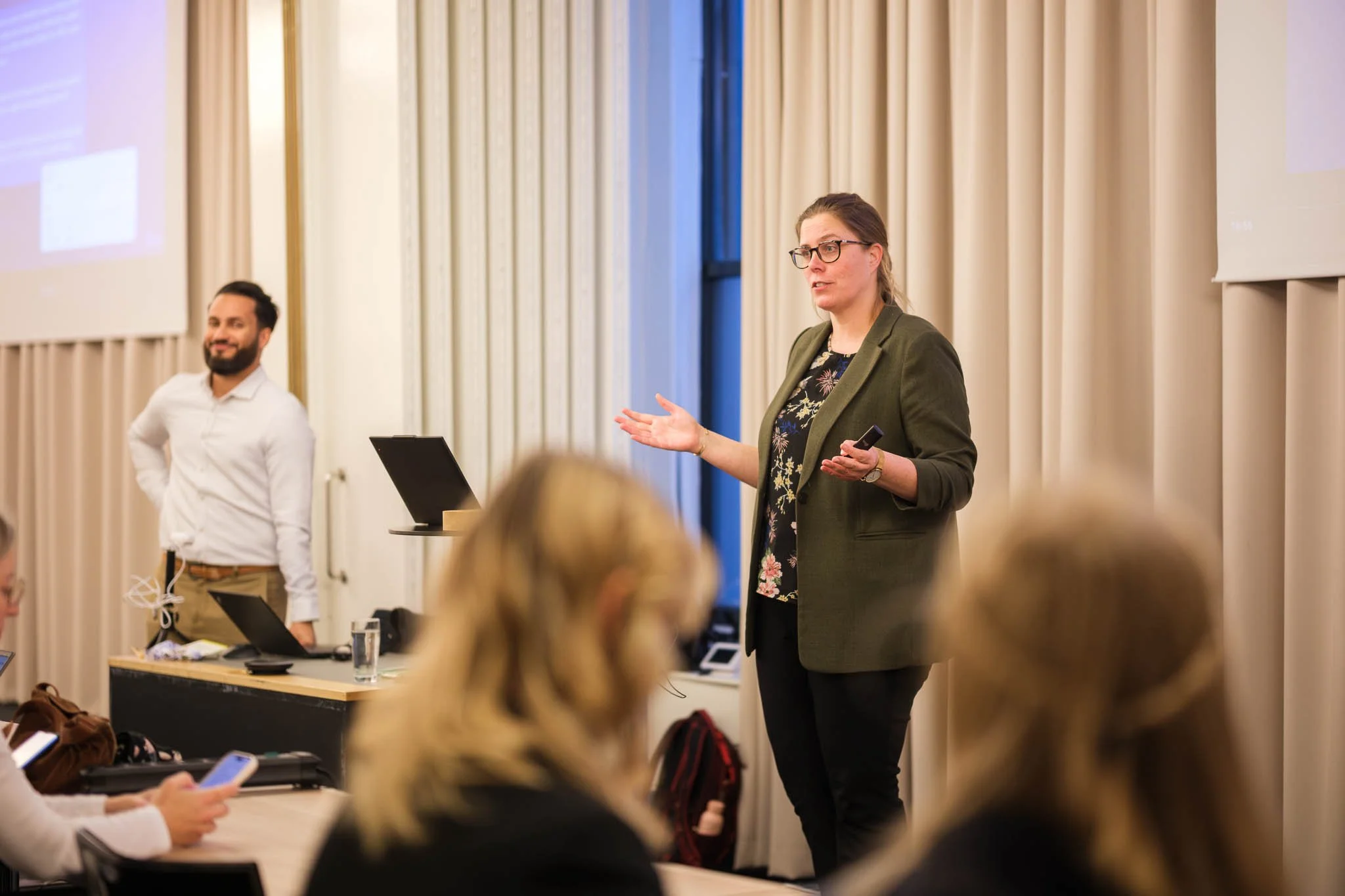 Workshop presenter addressing seated delegates at Illuminate EMEA 2026 — Copenhagen conference event photography Ballo Studio