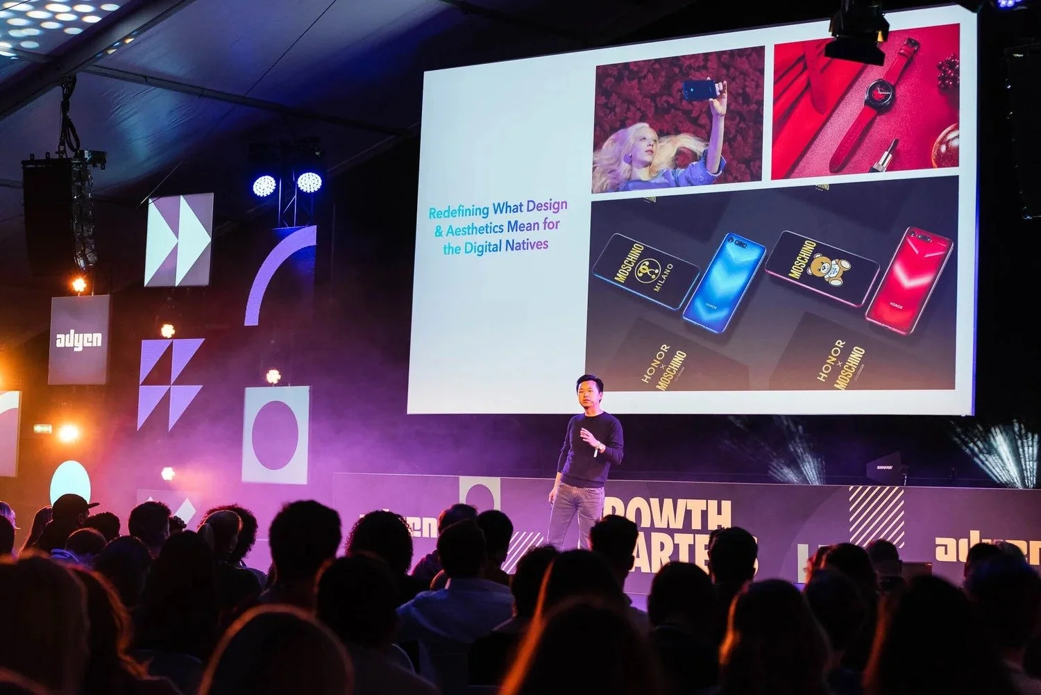 Audience and stage at Adyen Growth Quarters conference with design and digital natives presentation slide Amsterdam — event photography Amsterdam Ballo Studio