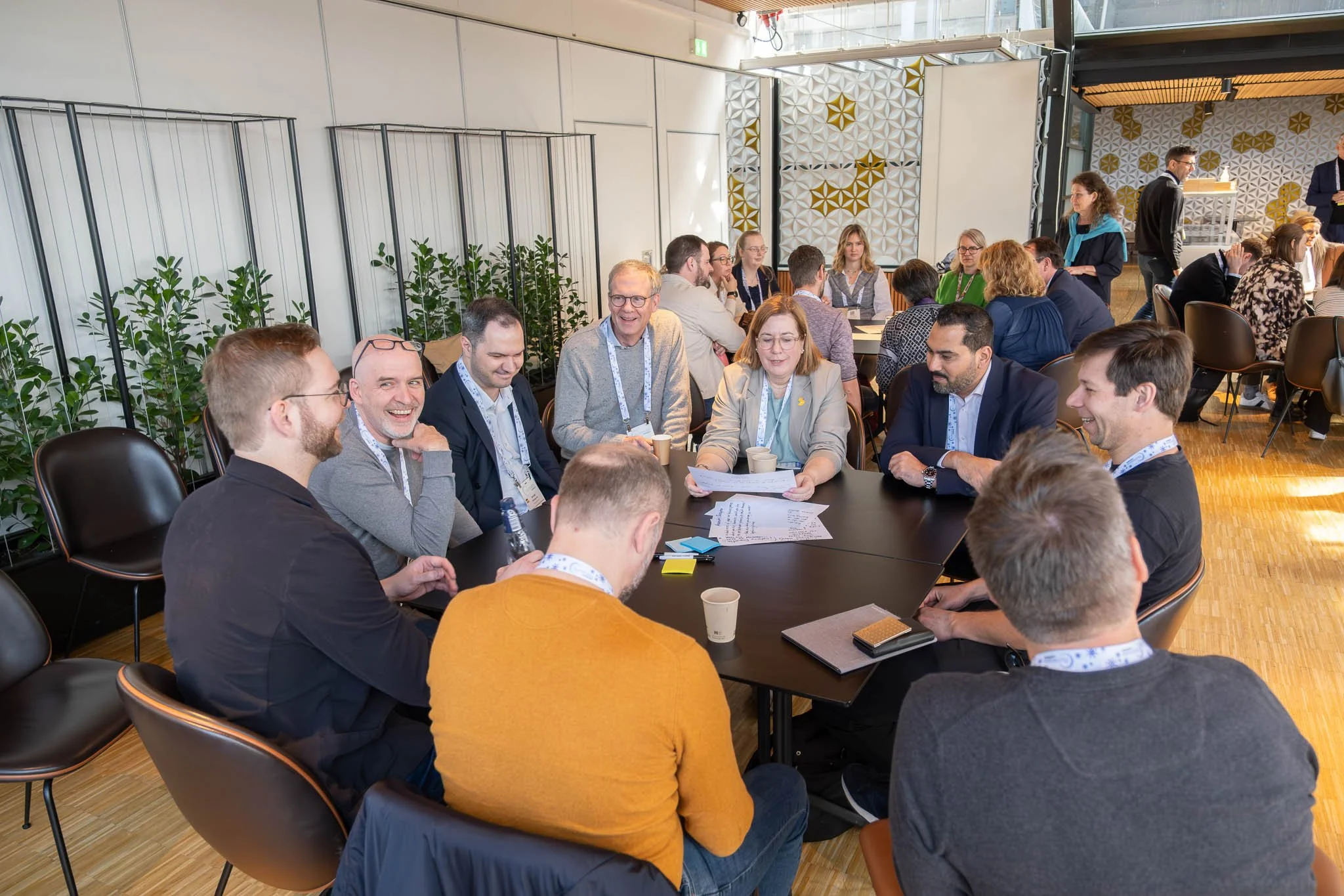 Workshop roundtable session with delegates at Illuminate EMEA 2026 — Copenhagen corporate event photography Ballo Studio