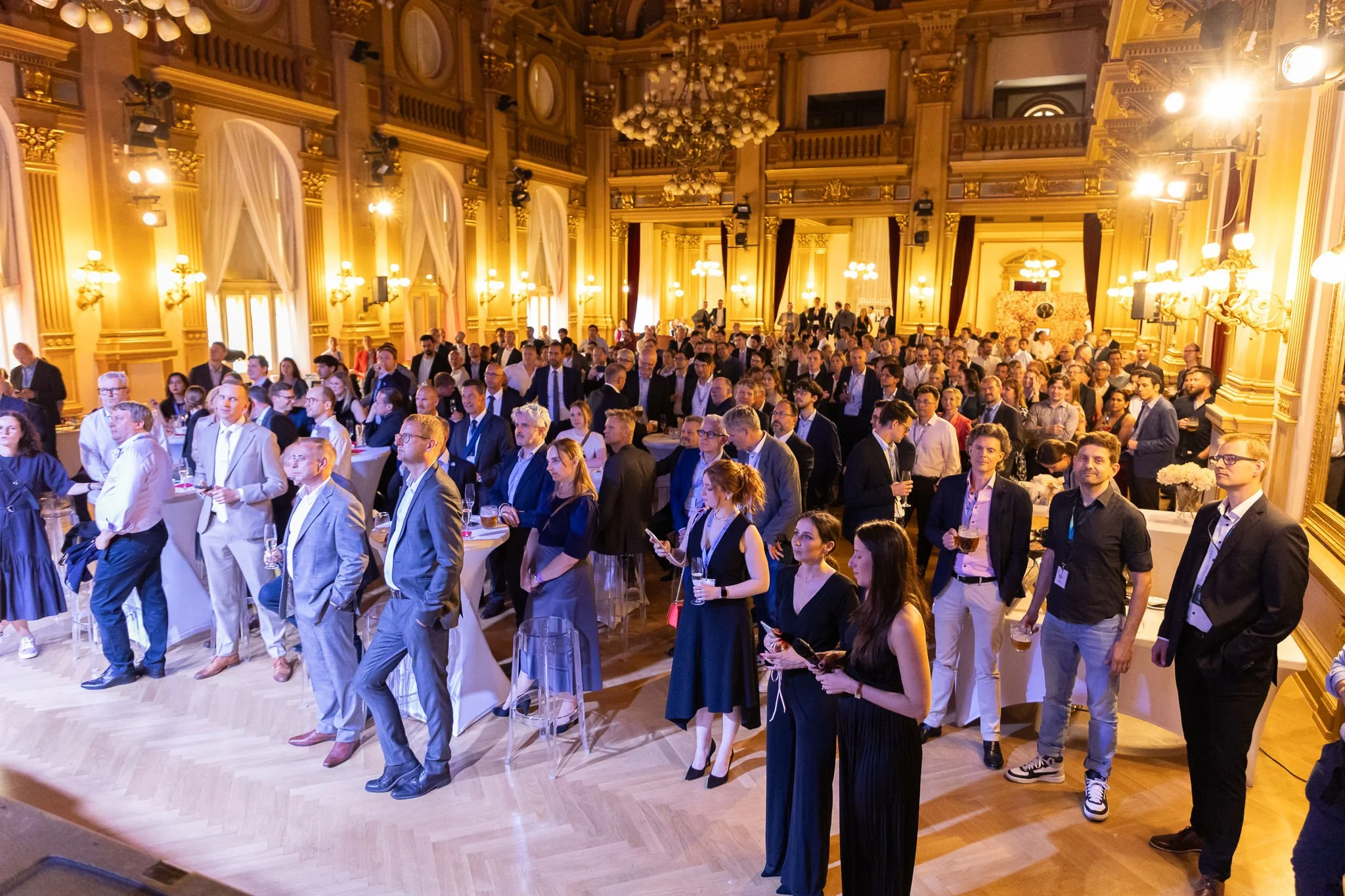 Conference gala dinner with hundreds of attendees networking in ornate ballroom at Euroheat & Power Congress Amsterdam — conference photography Ballo Studio