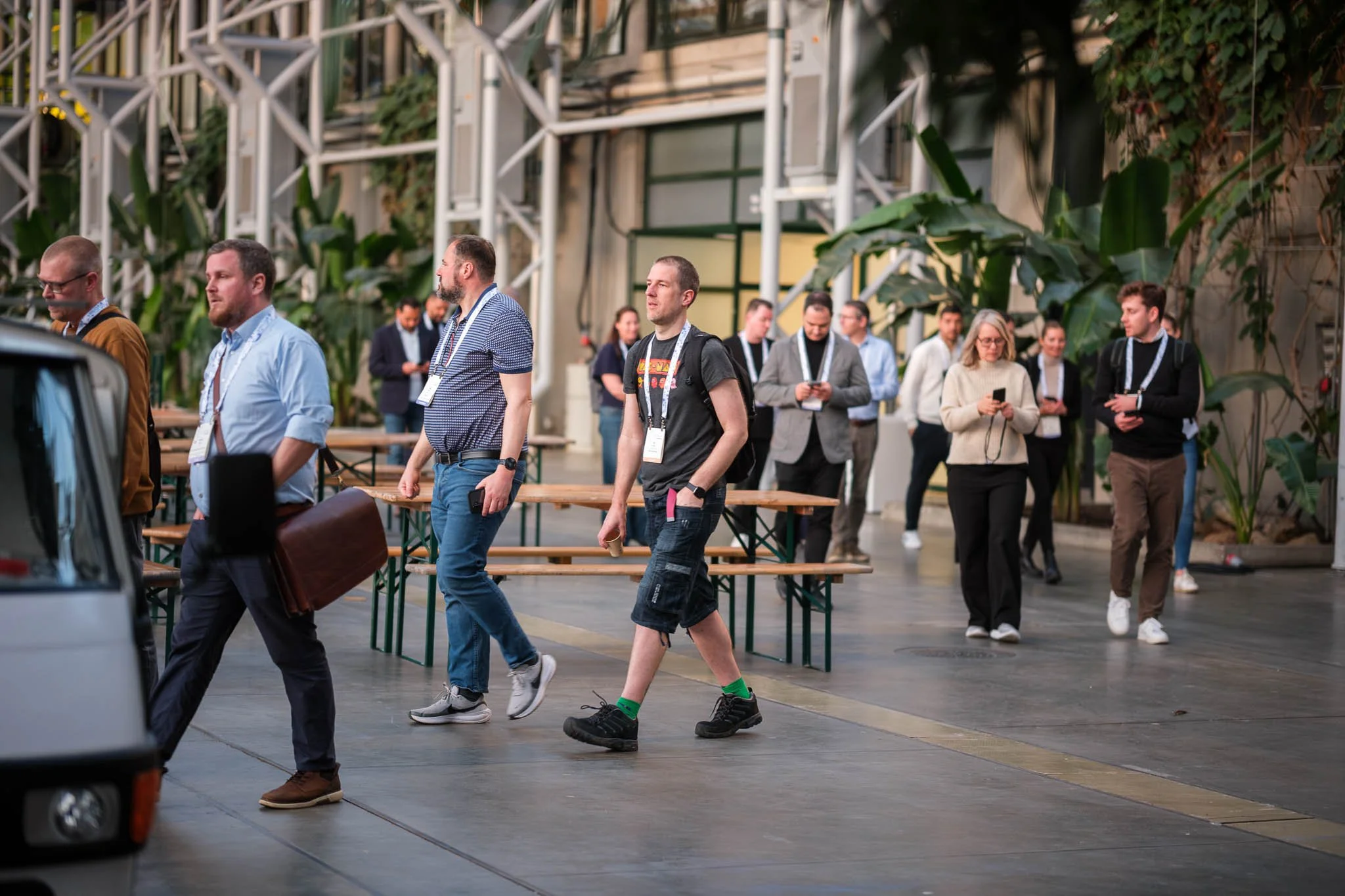 Delegates walking through Bella Center venue hall during Illuminate EMEA 2026 site tour — Copenhagen conference photography Ballo Studio
