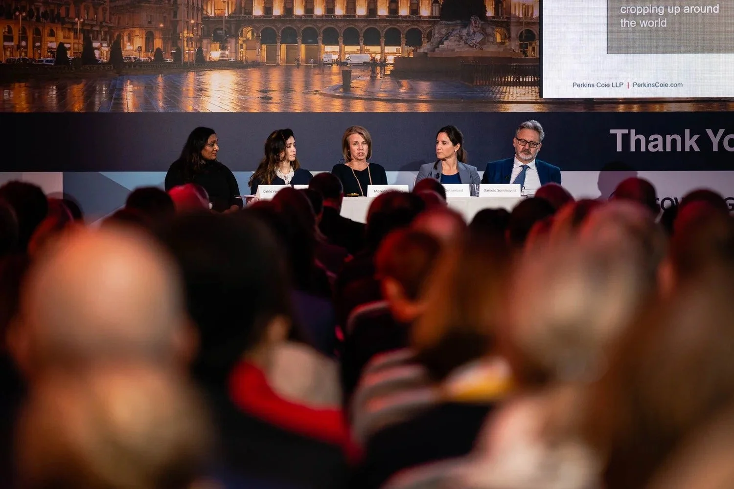 Five-person conference panel on stage with audience in foreground at international legal technology conference Amsterdam — event photography Amsterdam Ballo Studio