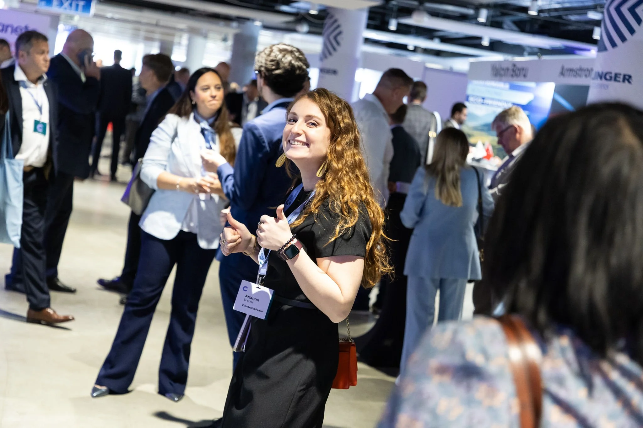 Attendee at exhibition stand on trade floor at Euroheat & Power Congress Amsterdam — conference photography Ballo Studio