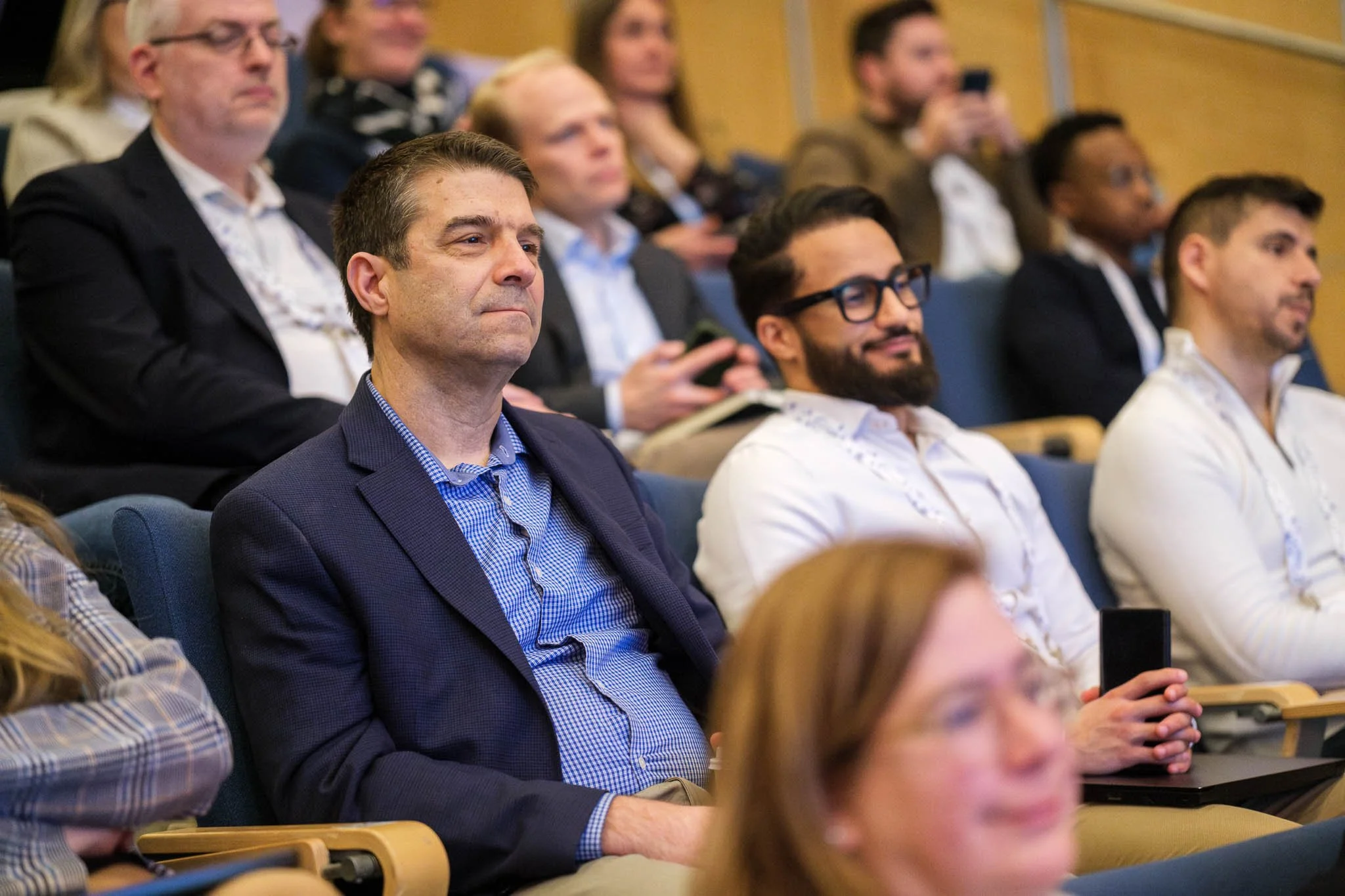Conference delegates watching keynote at Illuminate EMEA 2026 — event photography Copenhagen by Ballo Studio