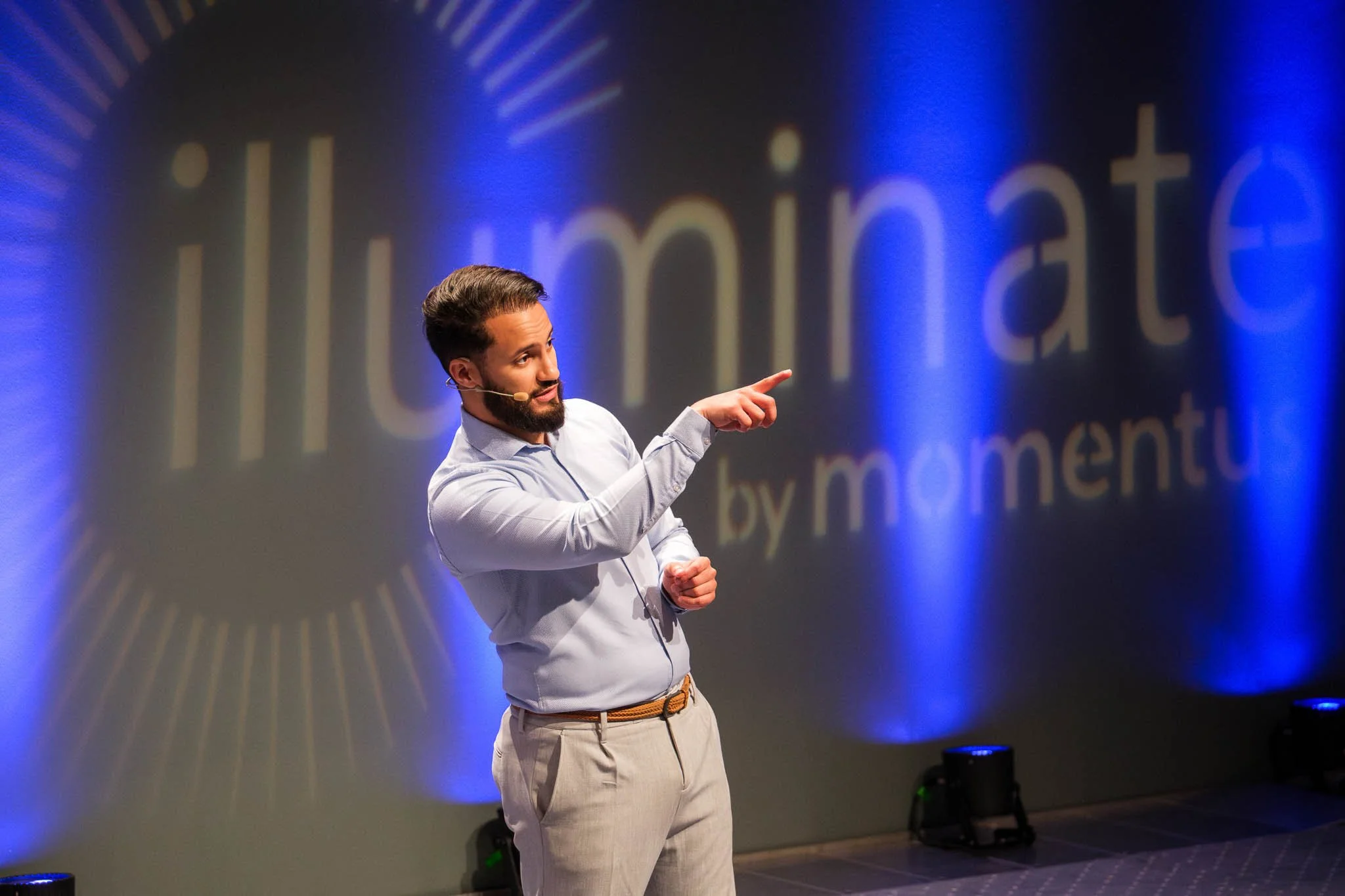 Keynote speaker presenting on stage at Illuminate EMEA 2026 — conference event photography Copenhagen by Ballo Studio