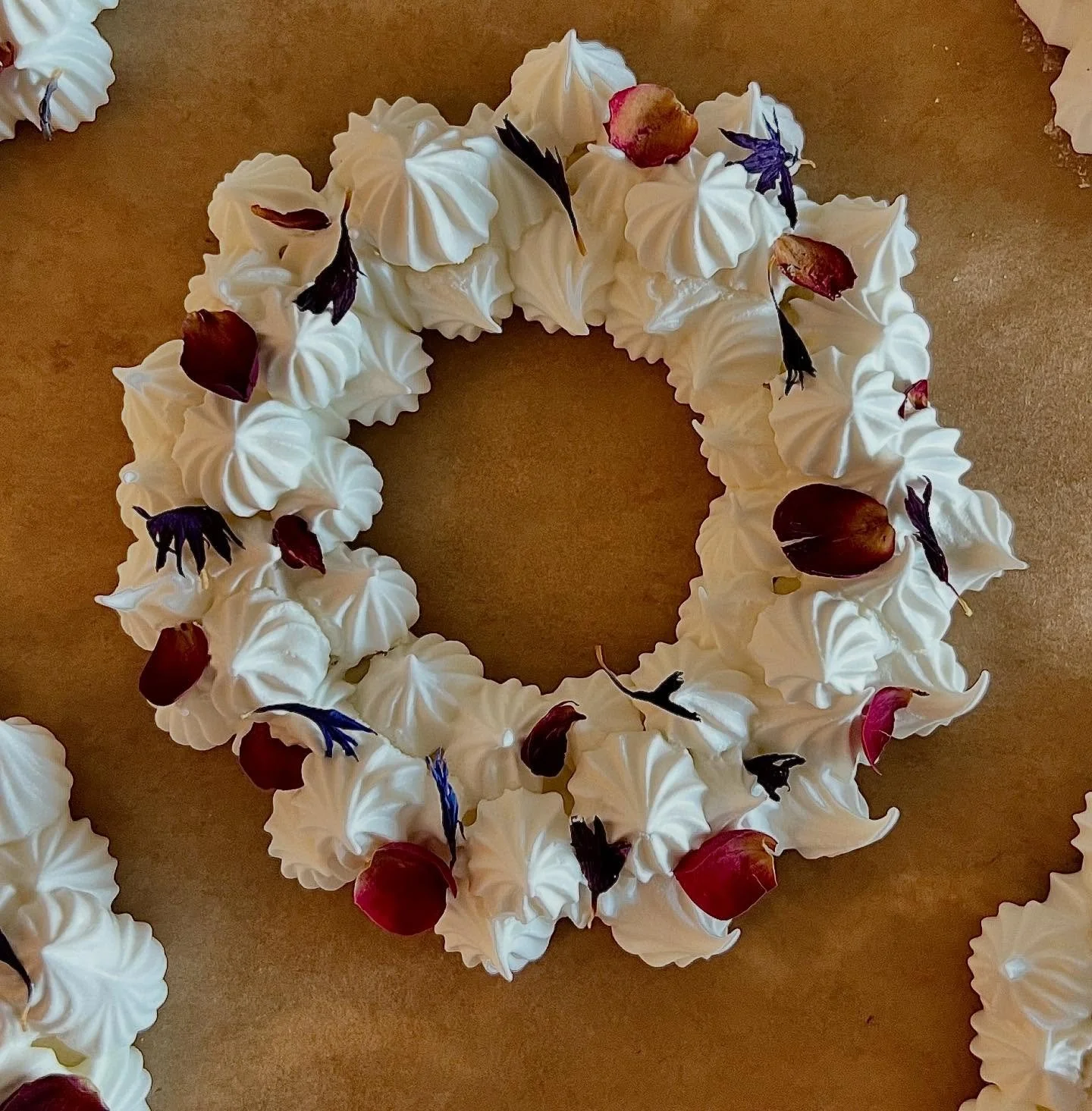 Edible meringue wreaths &amp; stars.

Biscuit ornaments are great, but meringue is quicker! Plus you can make extra and get a little pavlova sorted for Xmas pudding at the same time.

This recipe makes enough for around 9 stars and 8 wreaths; increas
