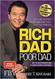 Book cover of 'Rich Dad Poor Dad' by Robert T. Kiyosaki with a photo of a smiling man and text in German.