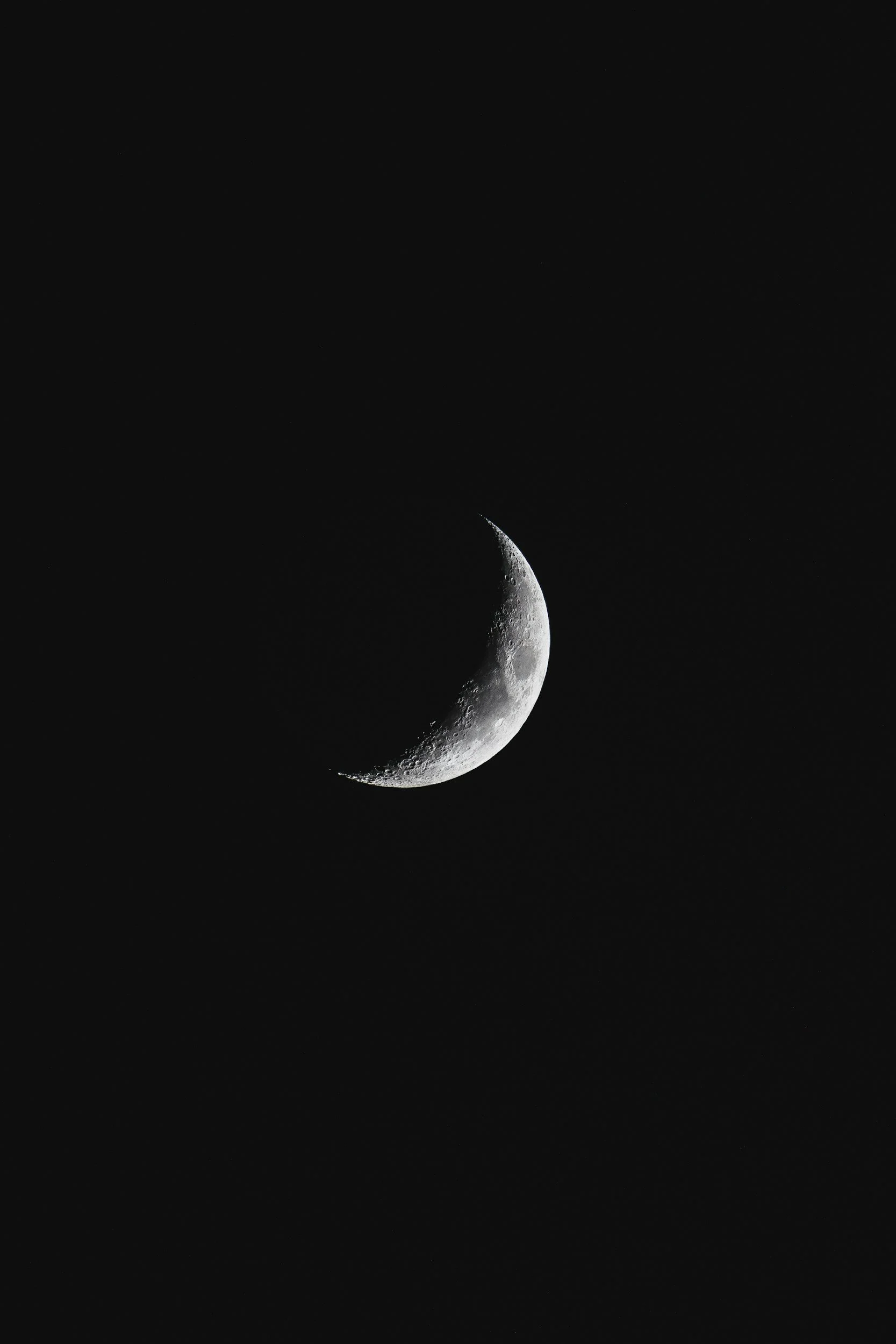 A close-up view of the moon showing its craters and surface details.