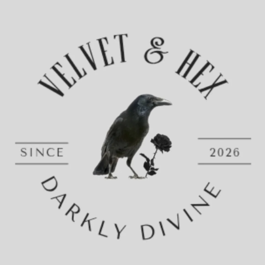 Design with a black bird, a rose, and the text "Velvet & Hex" and "Darkly Divine," mentioning "Since 2026".